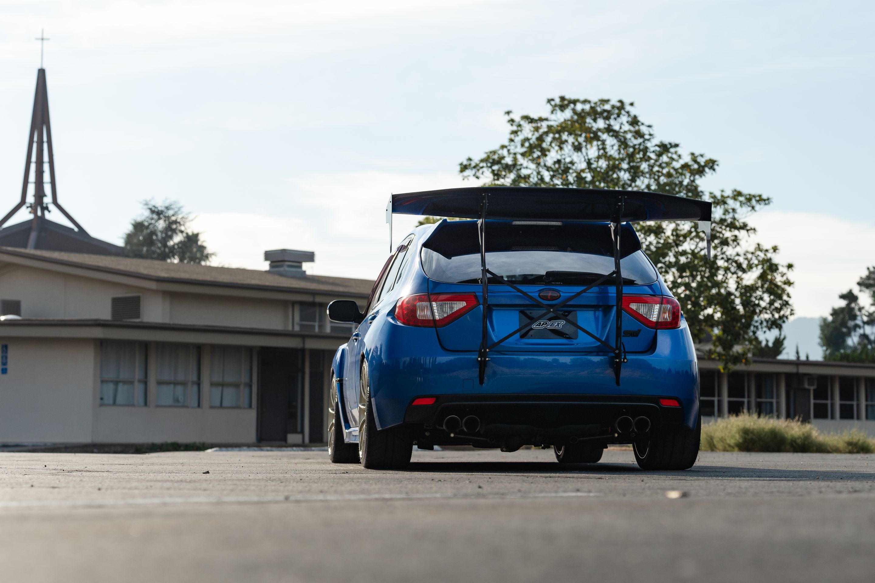 Blue Subaru GR WRX STI with 18" SM-10RS Apex wheels in Motorsport Gold