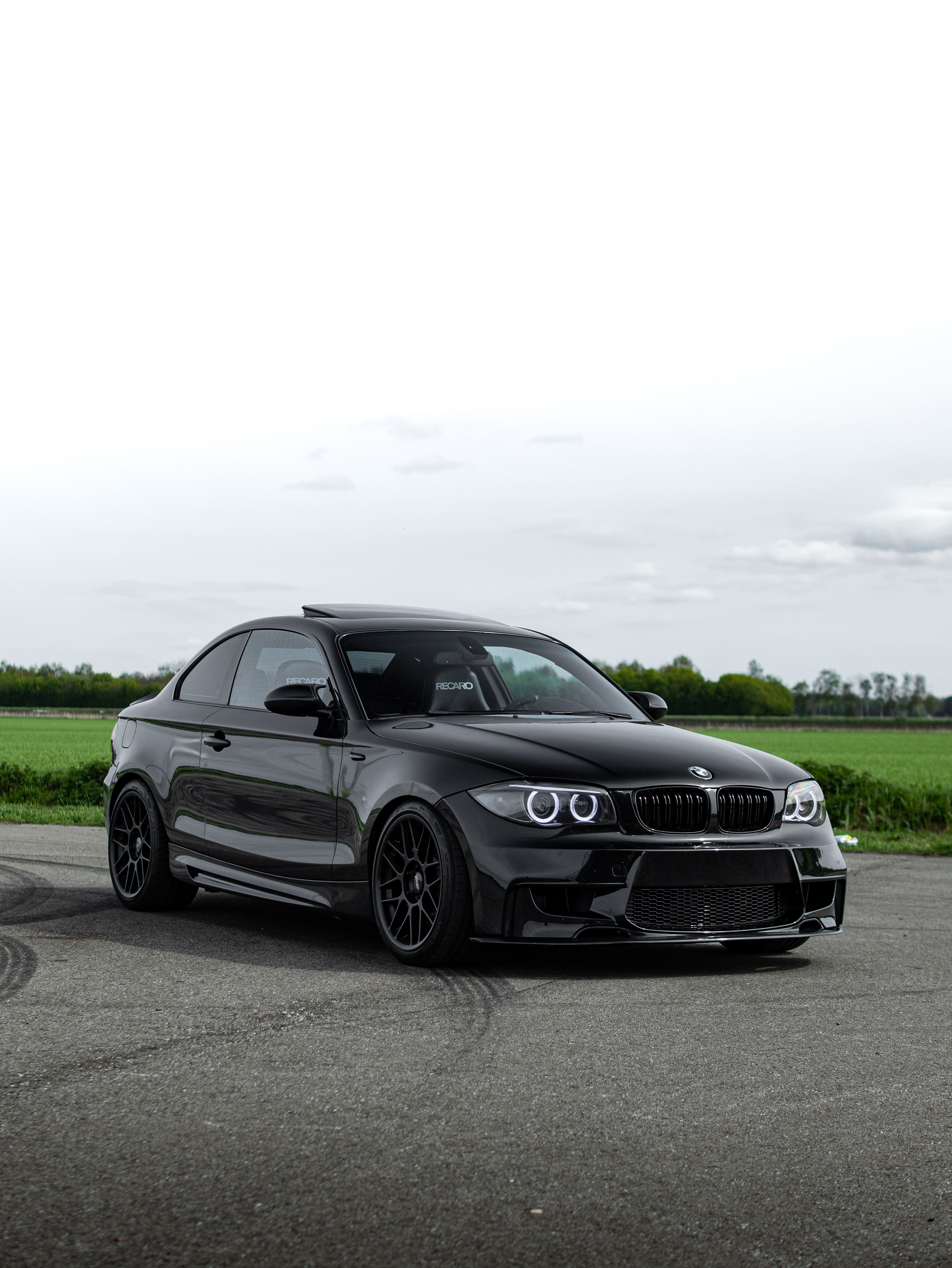 Black BMW E82 Coupe 1 Series with 18" ARC-8 Apex wheels in Satin Black