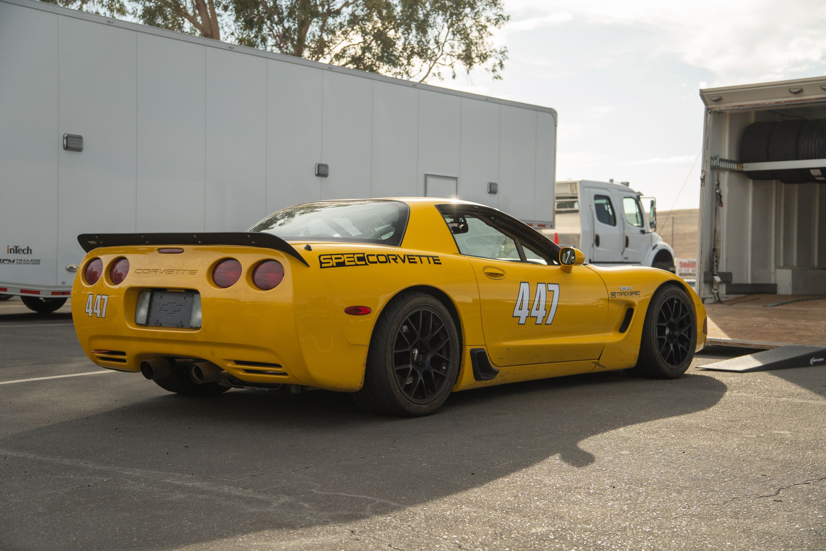 Yellow Chevrolet C5 Spec Corvette with 18" EC-7 Apex wheels in Satin Black