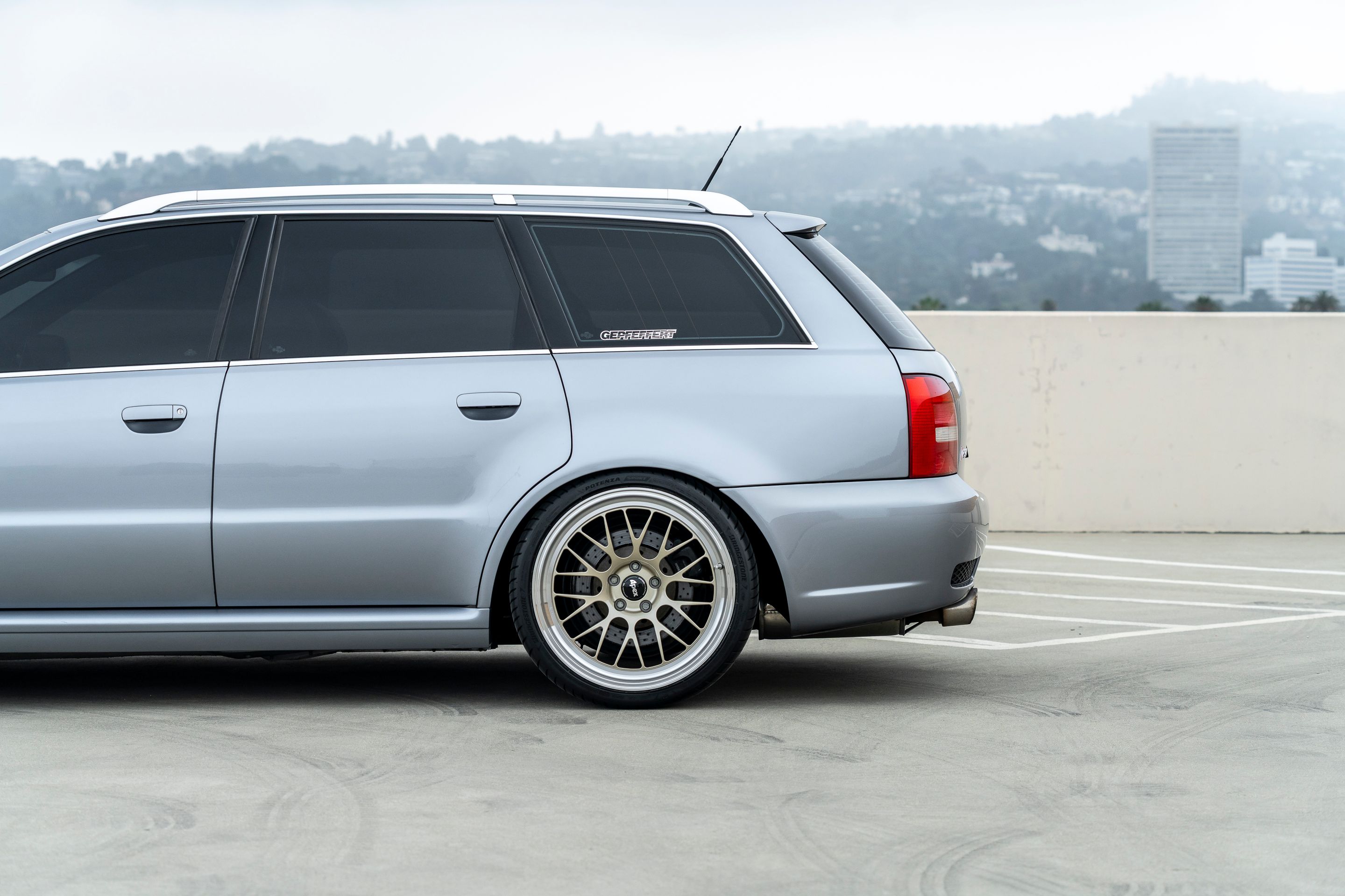 Silver Audi B5 RS 4 Avant/Wagon with 19" ML-10RT Apex wheels in Machined Lip Gloss Motorsport Gold