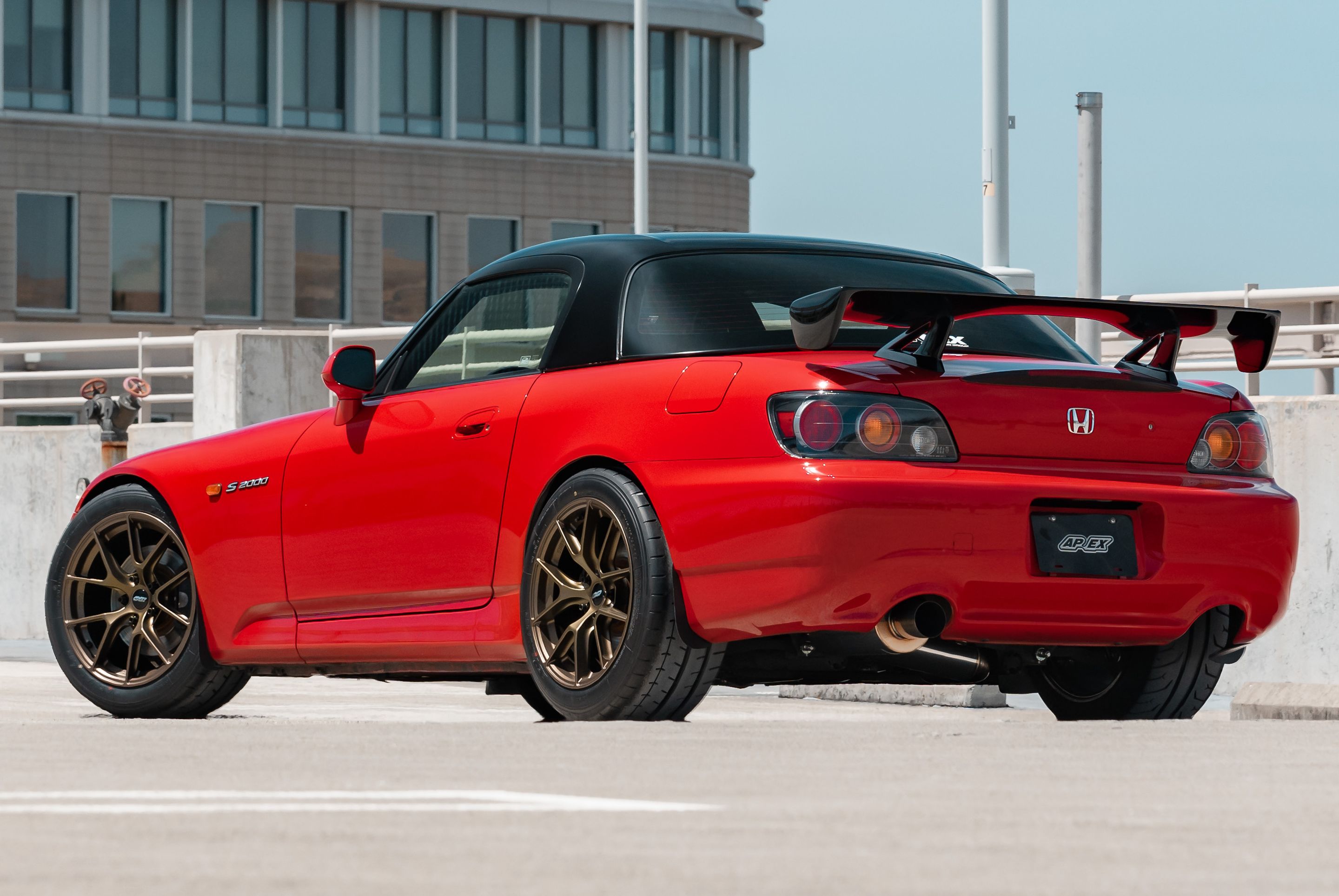 Red Honda S2000 with 17" VS-5RS Apex wheels in Satin Bronze