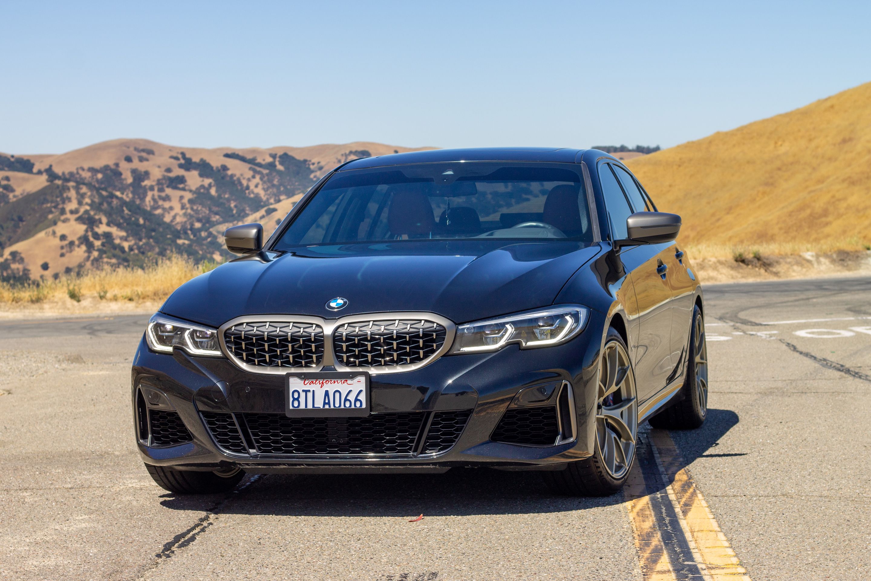 Black BMW G20 Sedan 3 Series with 19" VS-5RS Apex wheels in Motorsport Gold
