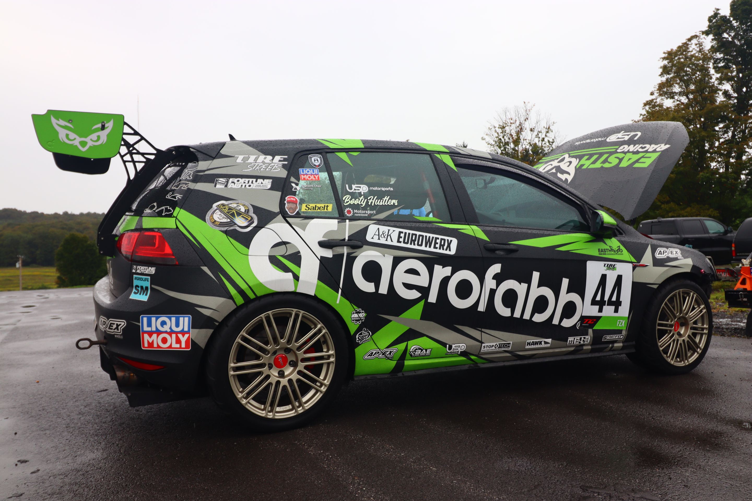 Race Livery VW MK7 GTI with 18" TC-10RT Apex wheels in Motorsport Gold