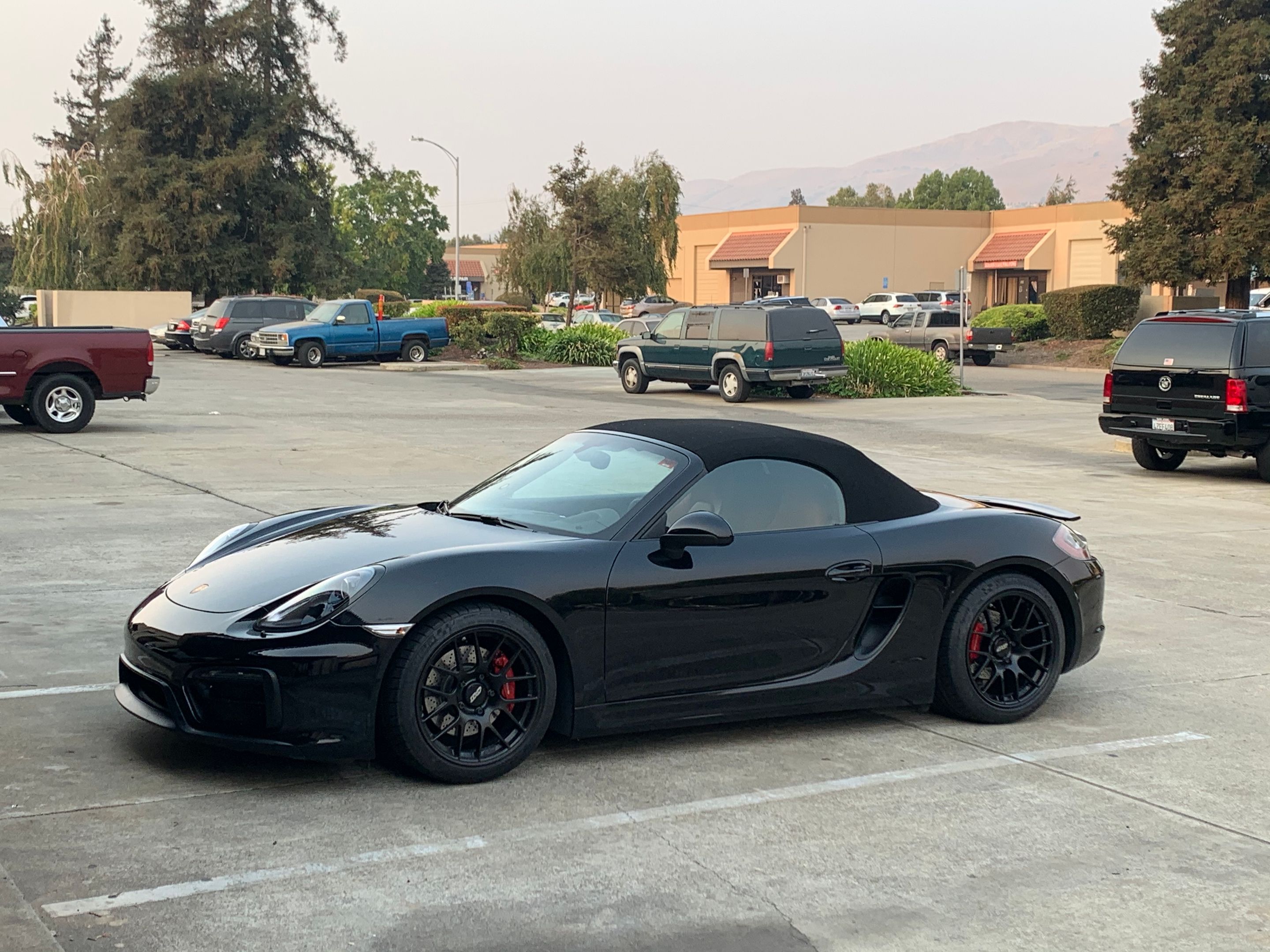 Black Porsche 981 Boxster GTS with 18" EC-7R Apex wheels in Satin Black