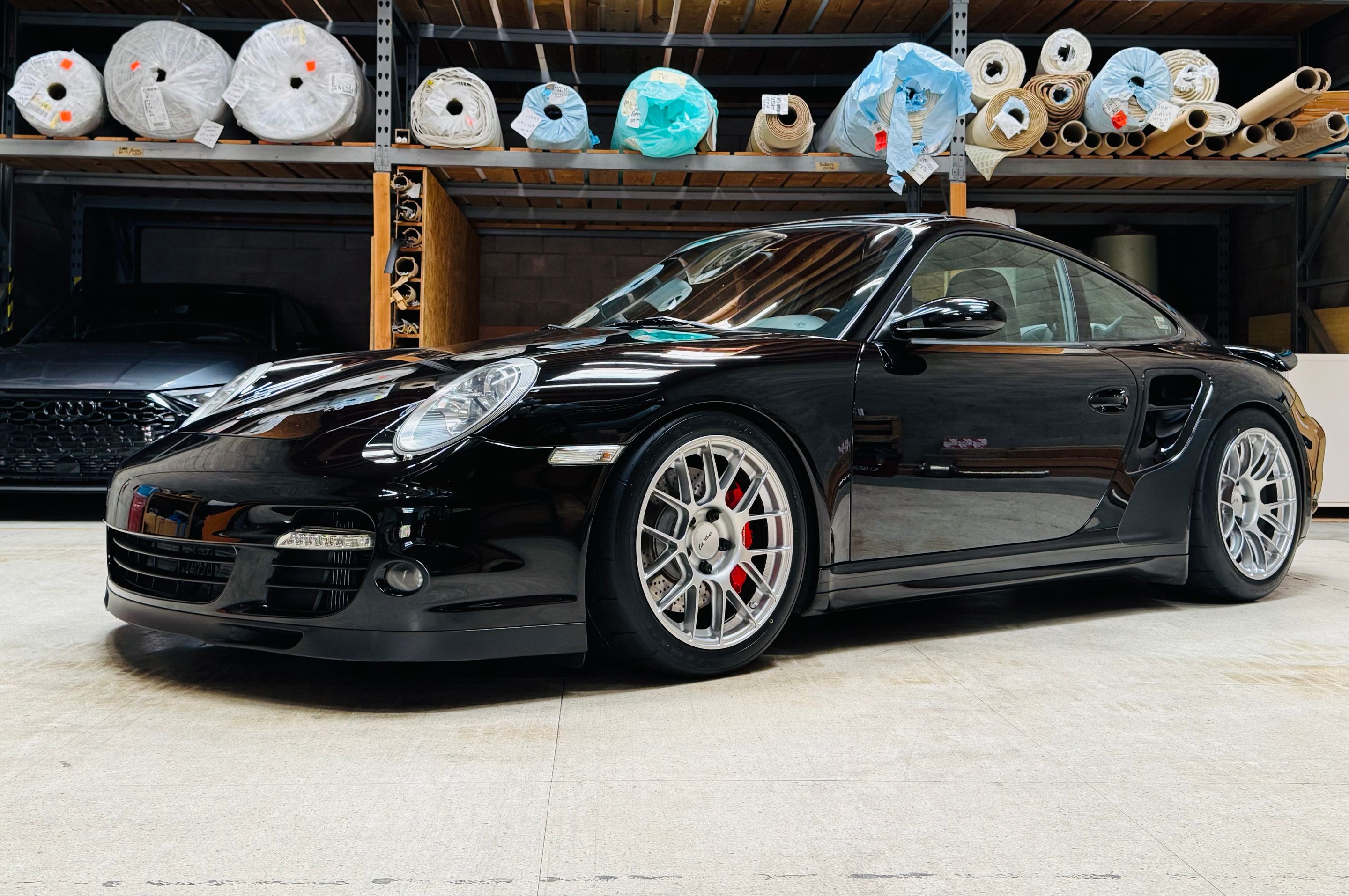 Black Porsche 911 997 Turbo with 18" EC-7RS Apex wheels in Race Silver