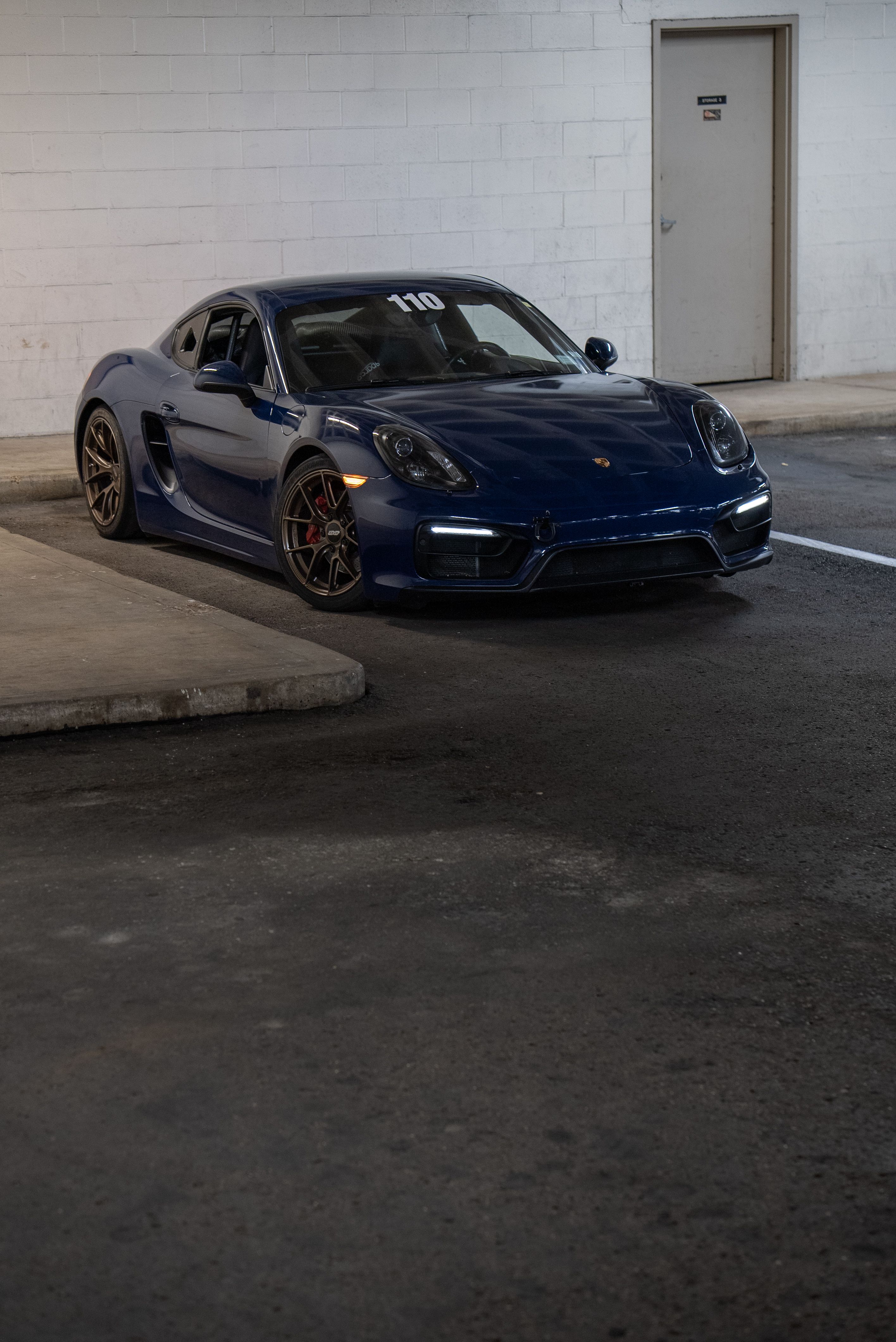 Blue Porsche 981 Cayman GTS with 18" VS-5RS Apex wheels in Satin Bronze