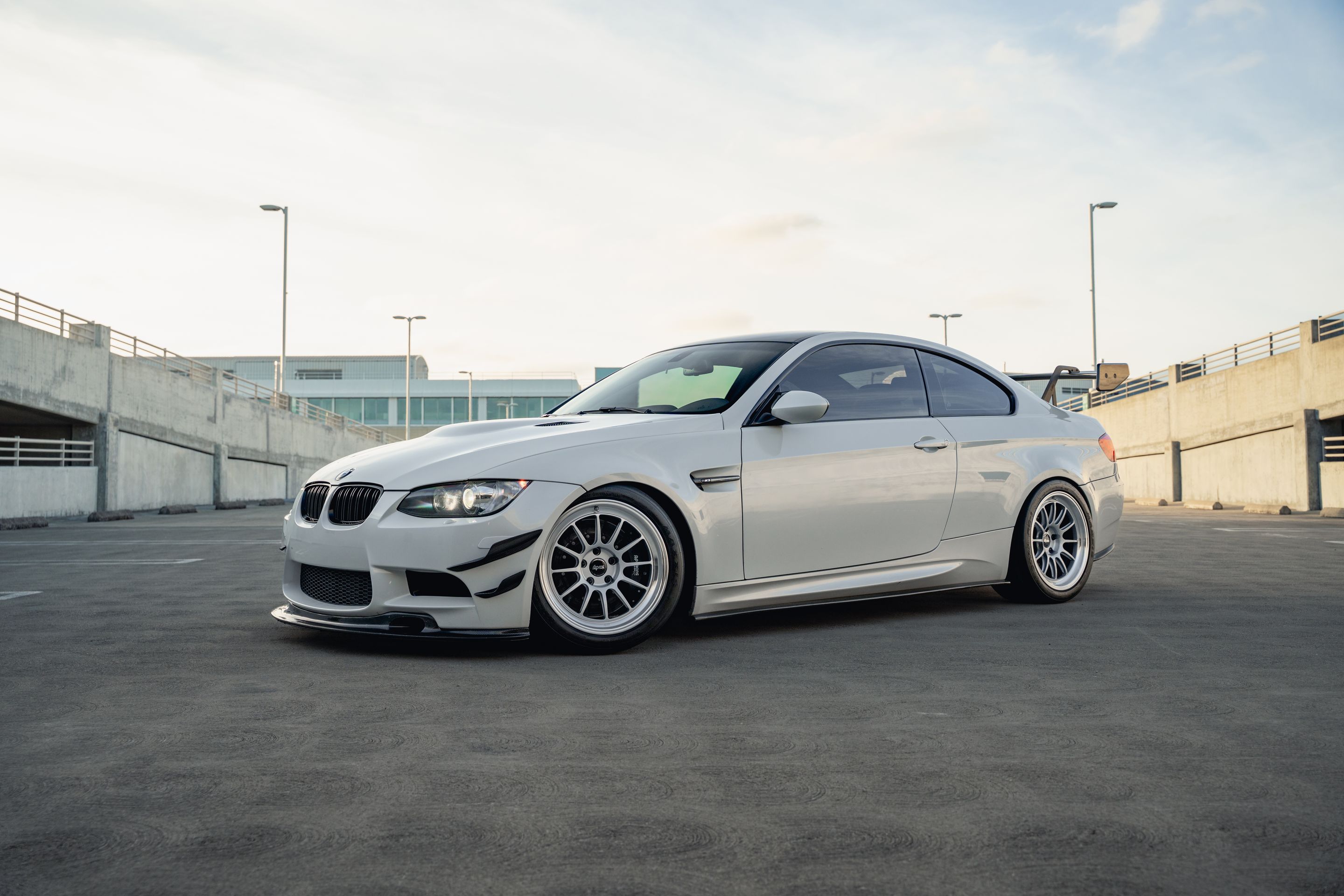 White BMW E92 Coupe M3 with 18" SL-12 Apex wheels in Machined Lip Race Silver