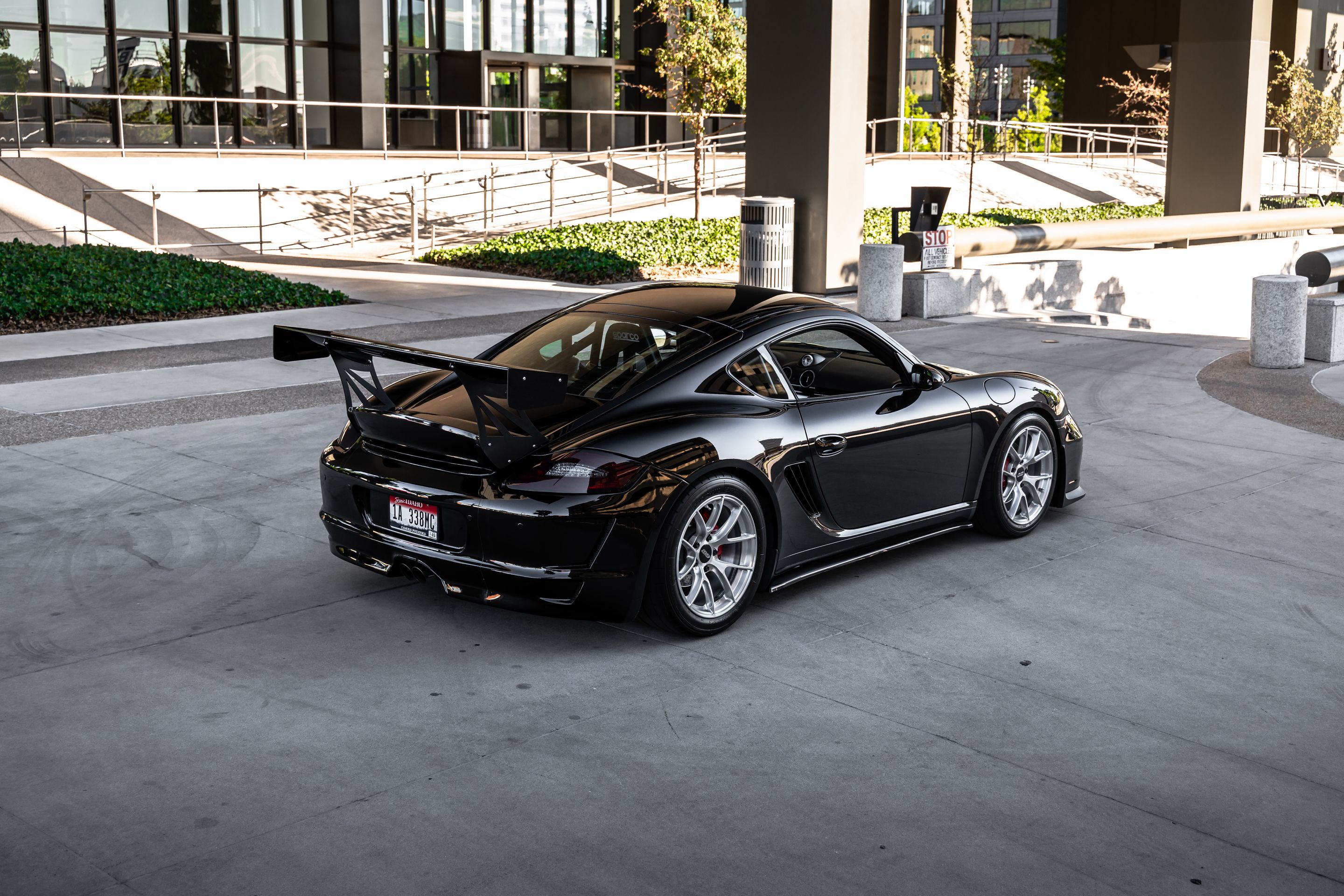 Black Porsche 987 Cayman S with 18" VS-5RS Apex wheels in Brushed Clear