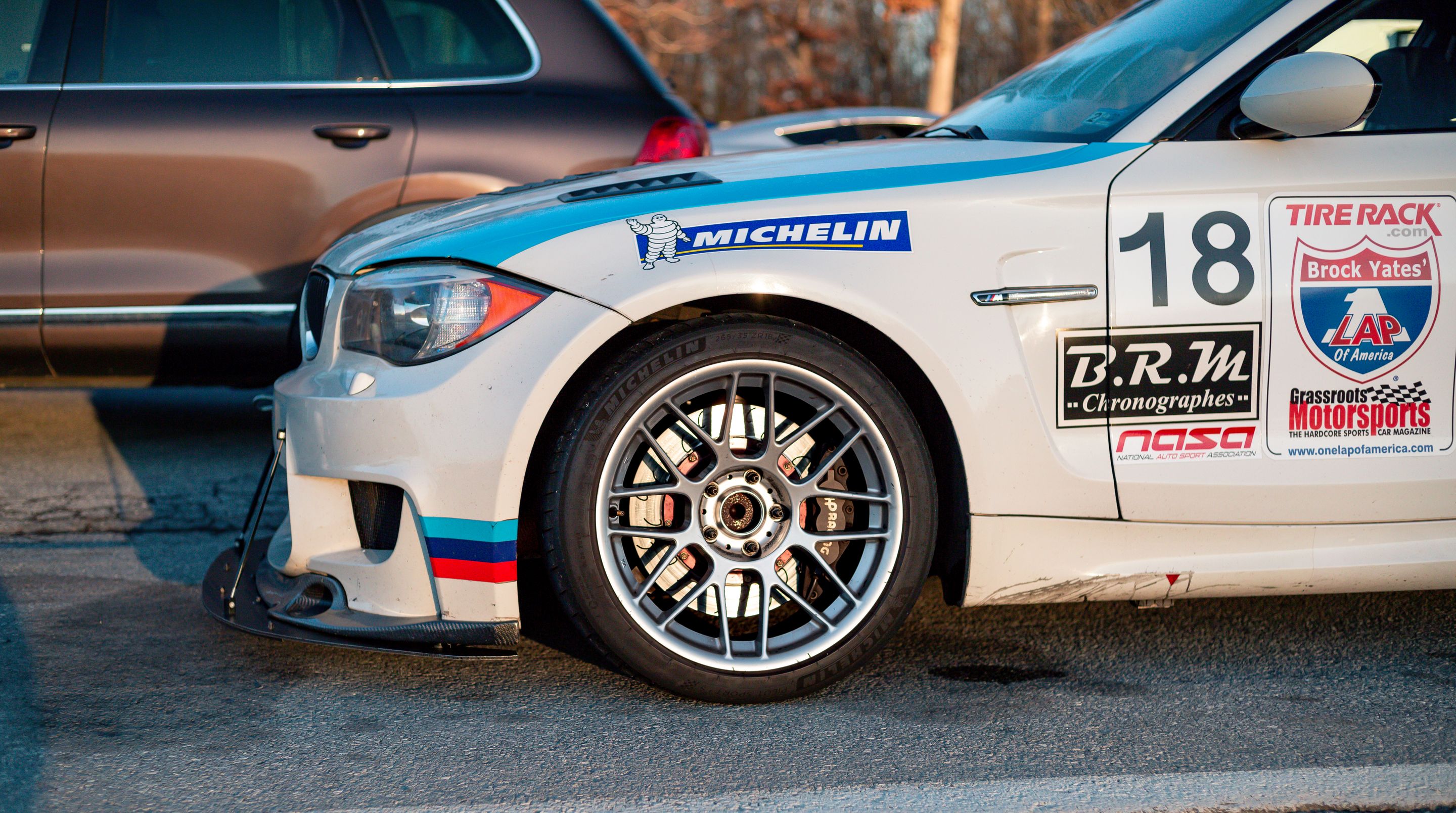 White BMW E82 1M with 18" ARC-8 Apex wheels in Hyper Silver