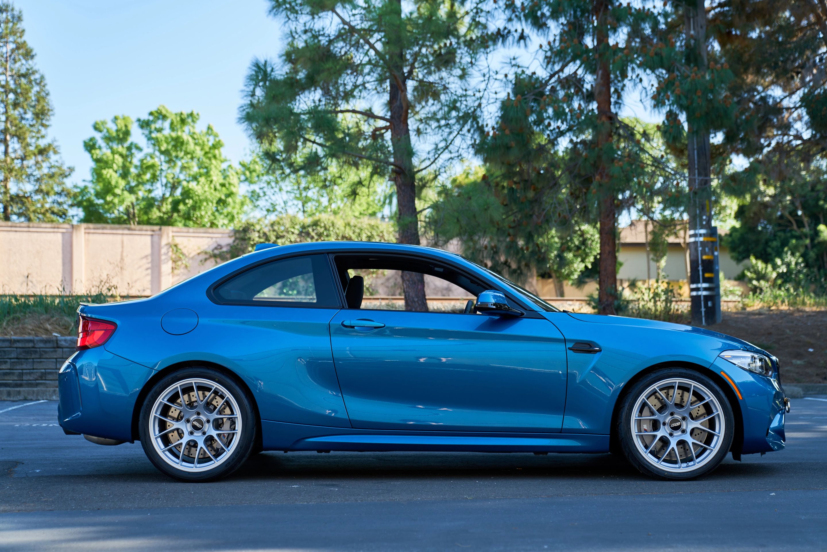 Blue BMW F87 M2 with 19" EC-7 Apex wheels in Race Silver