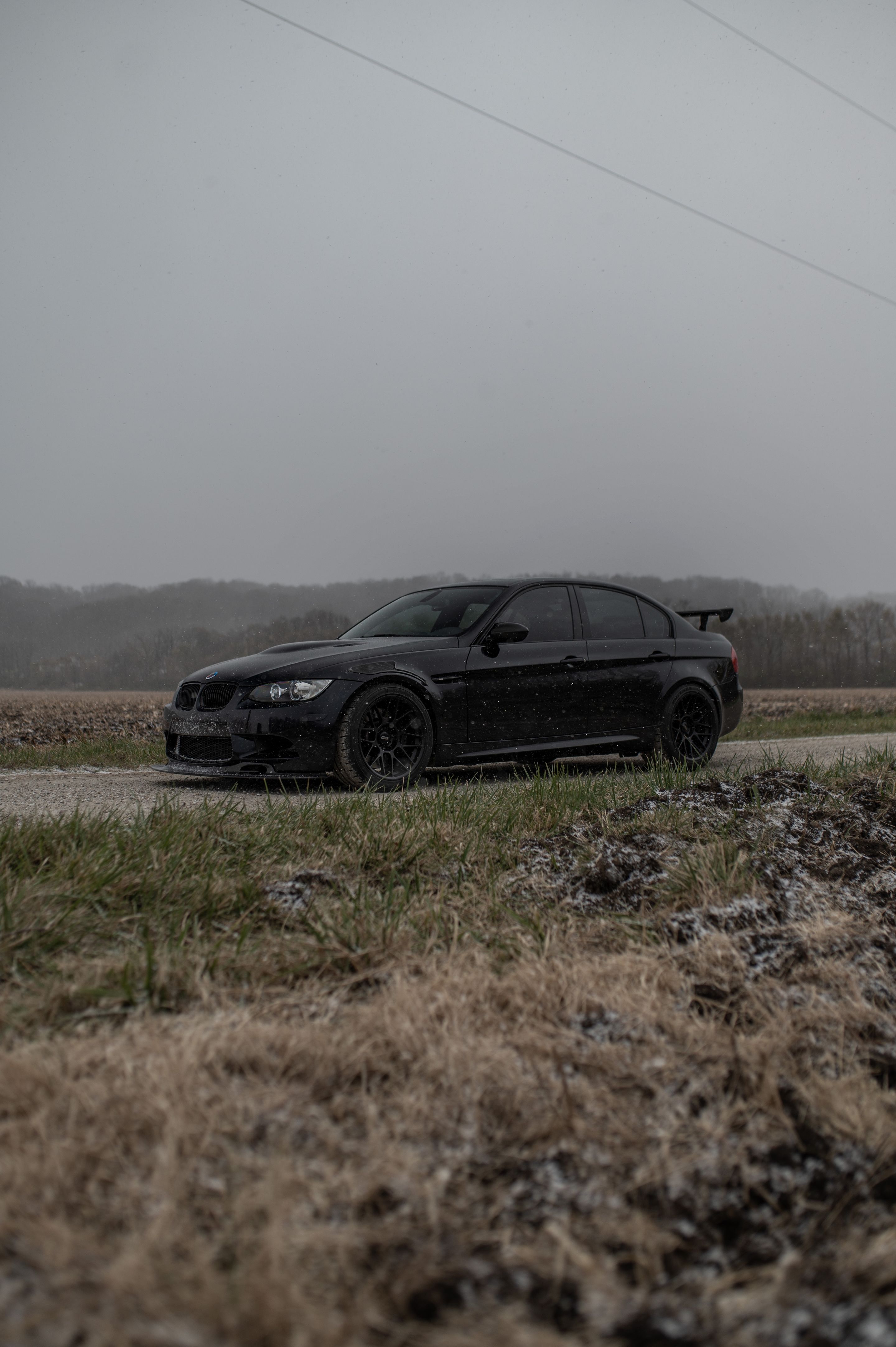 Black BMW E90 Sedan M3 with 18" ARC-8 Apex wheels in Satin Black