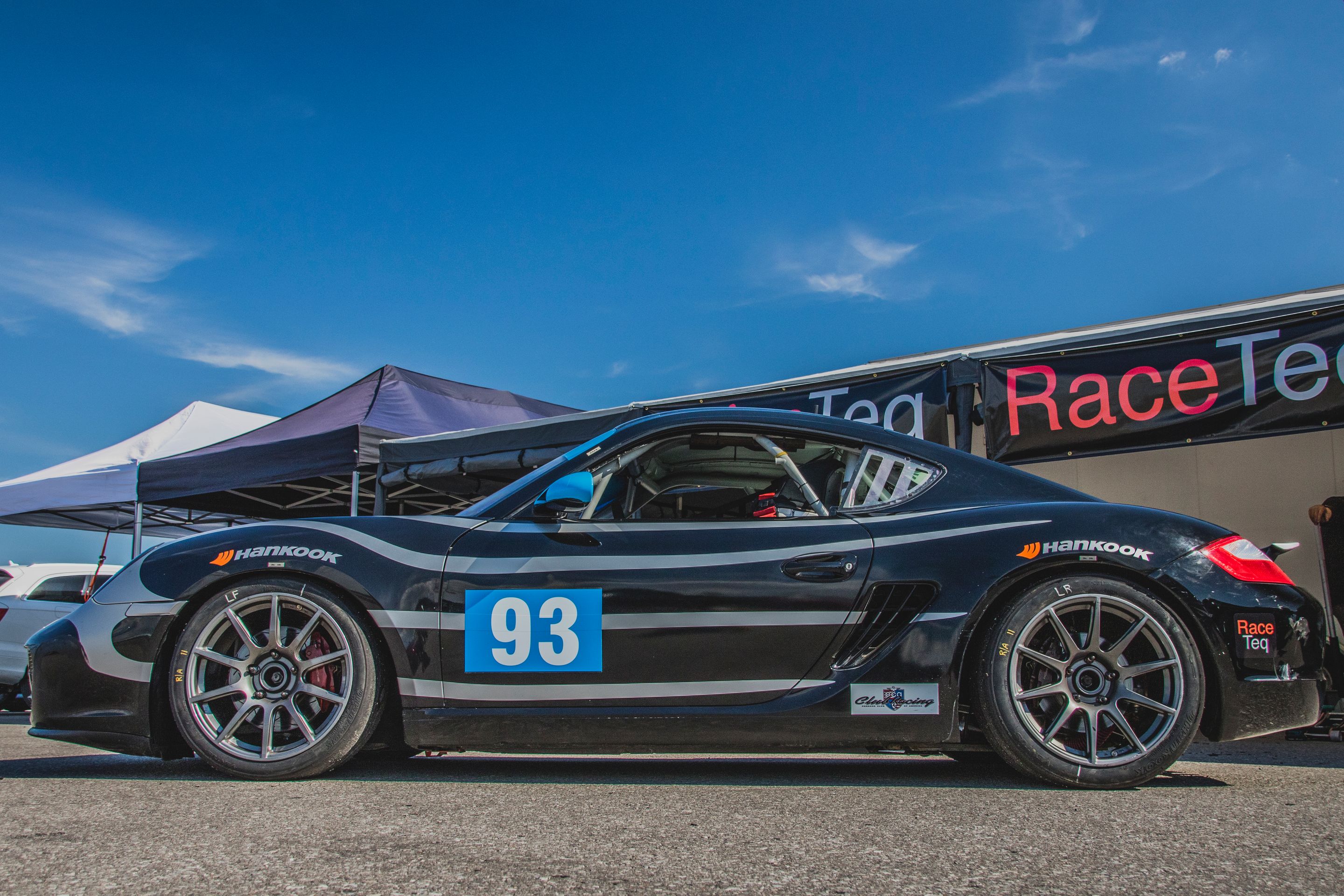 Black Porsche 987 Spec Cayman (SPC) with 18" SM-10 Apex wheels in Anthracite