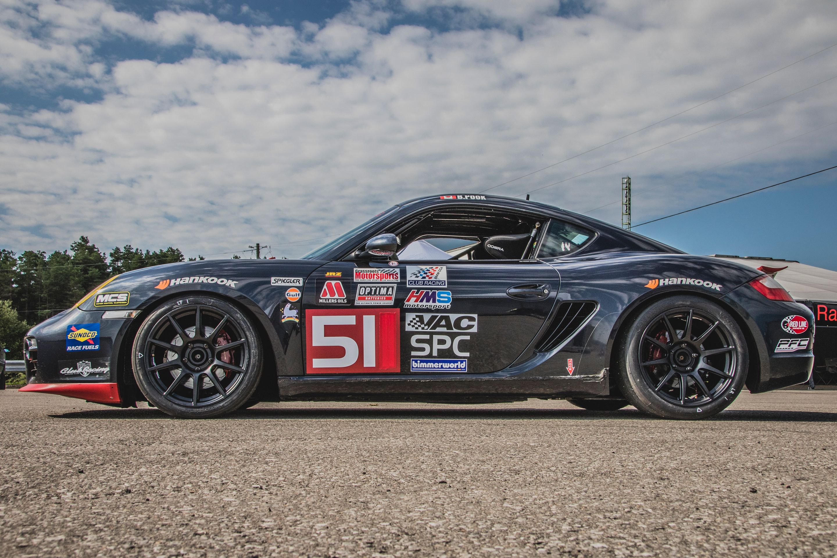 Black Porsche 987 Spec Cayman (SPC) with 18" SM-10 Apex wheels in Satin Black