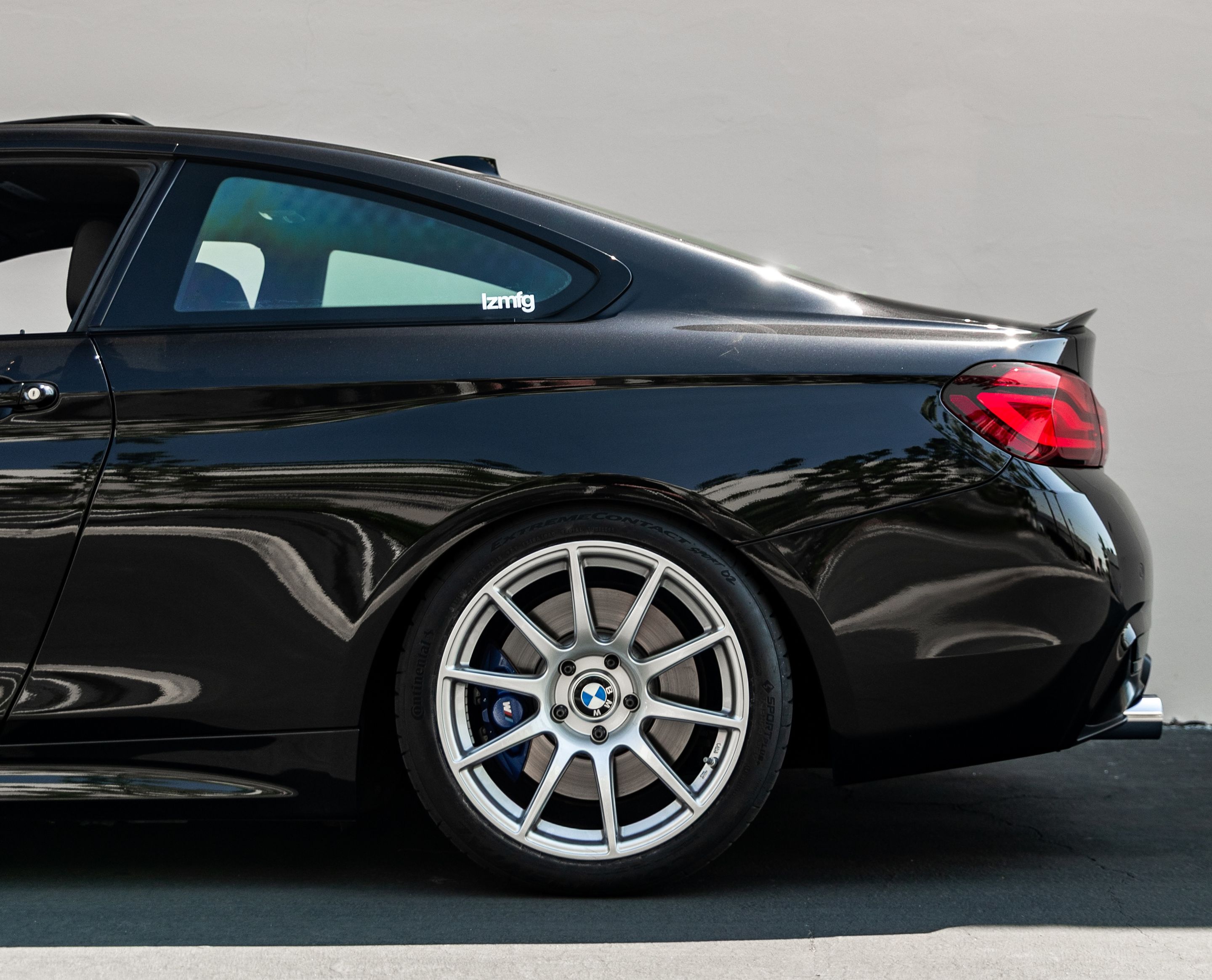 Black BMW F32 Coupe 4 Series with 18" SM-10 Apex wheels in Race Silver
