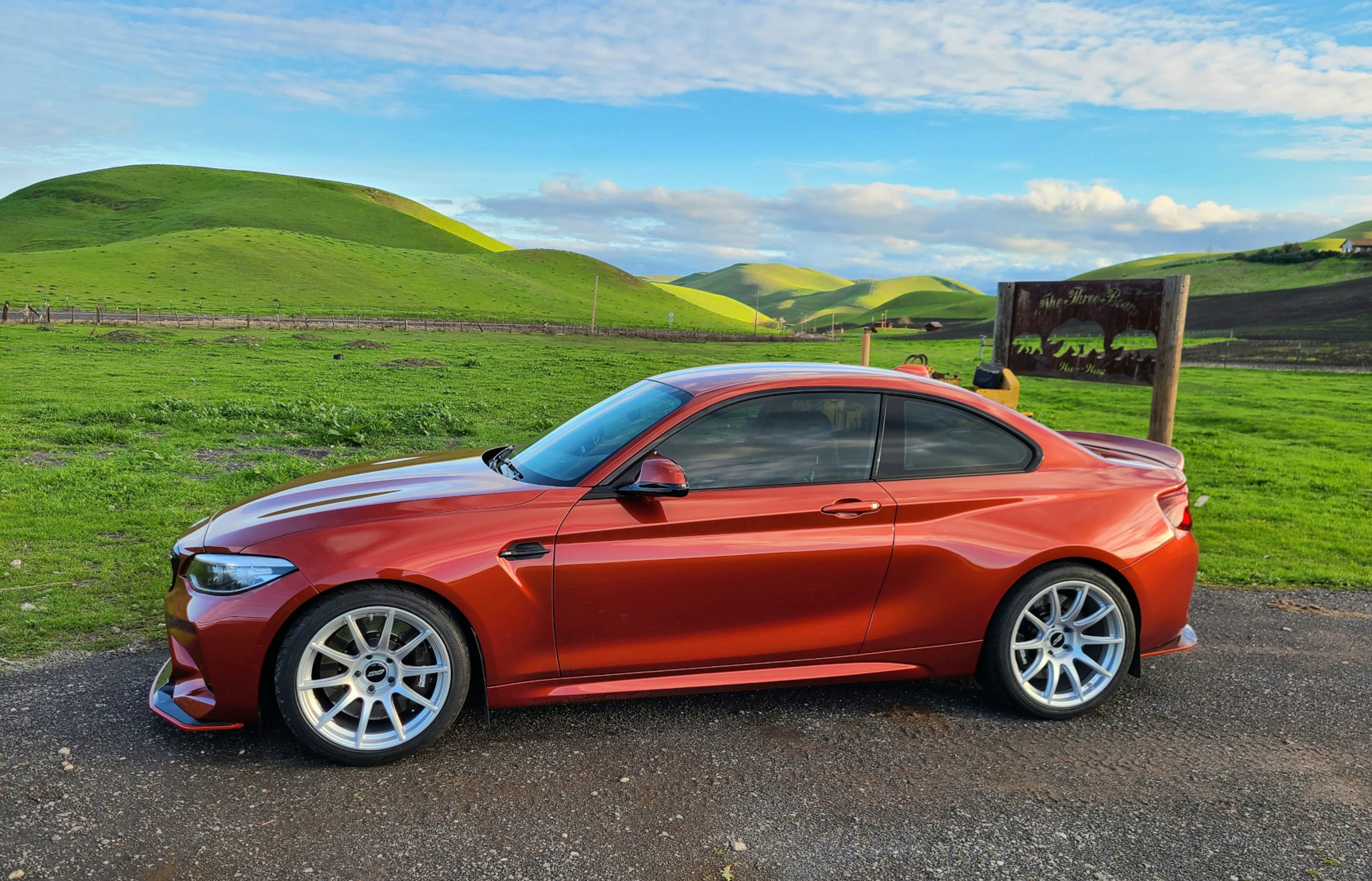 Orange BMW F87 M2 with 18"/19" SM-10 Apex wheels in Race Silver
