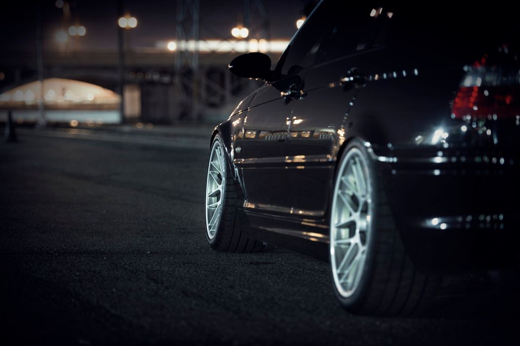 Black BMW E46 3 Series with 18" ARC-8 Apex wheels in Hyper Silver