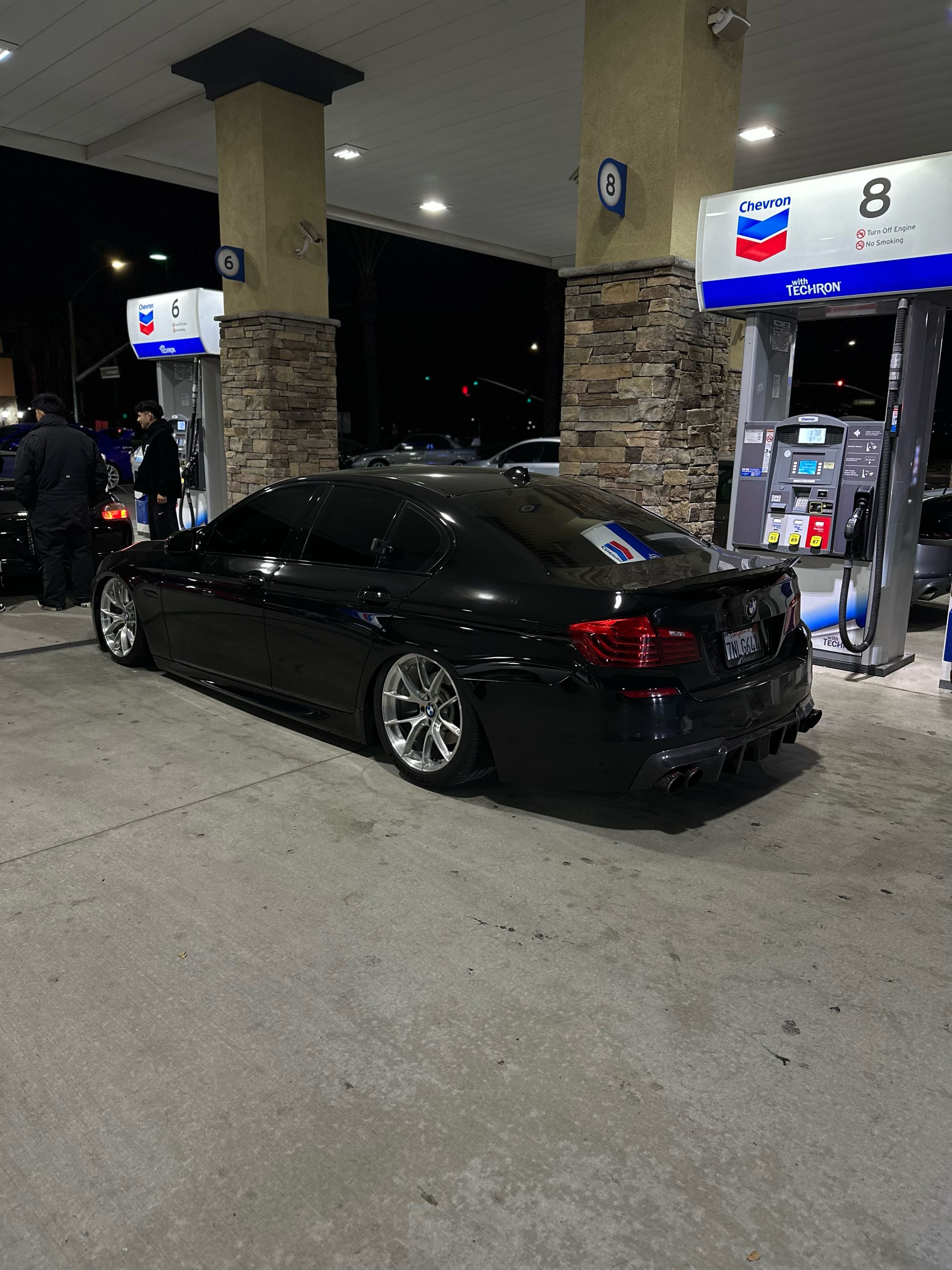 Black BMW F10 Sedan 5 Series with 19" VS-5RS Apex wheels in Brushed Clear