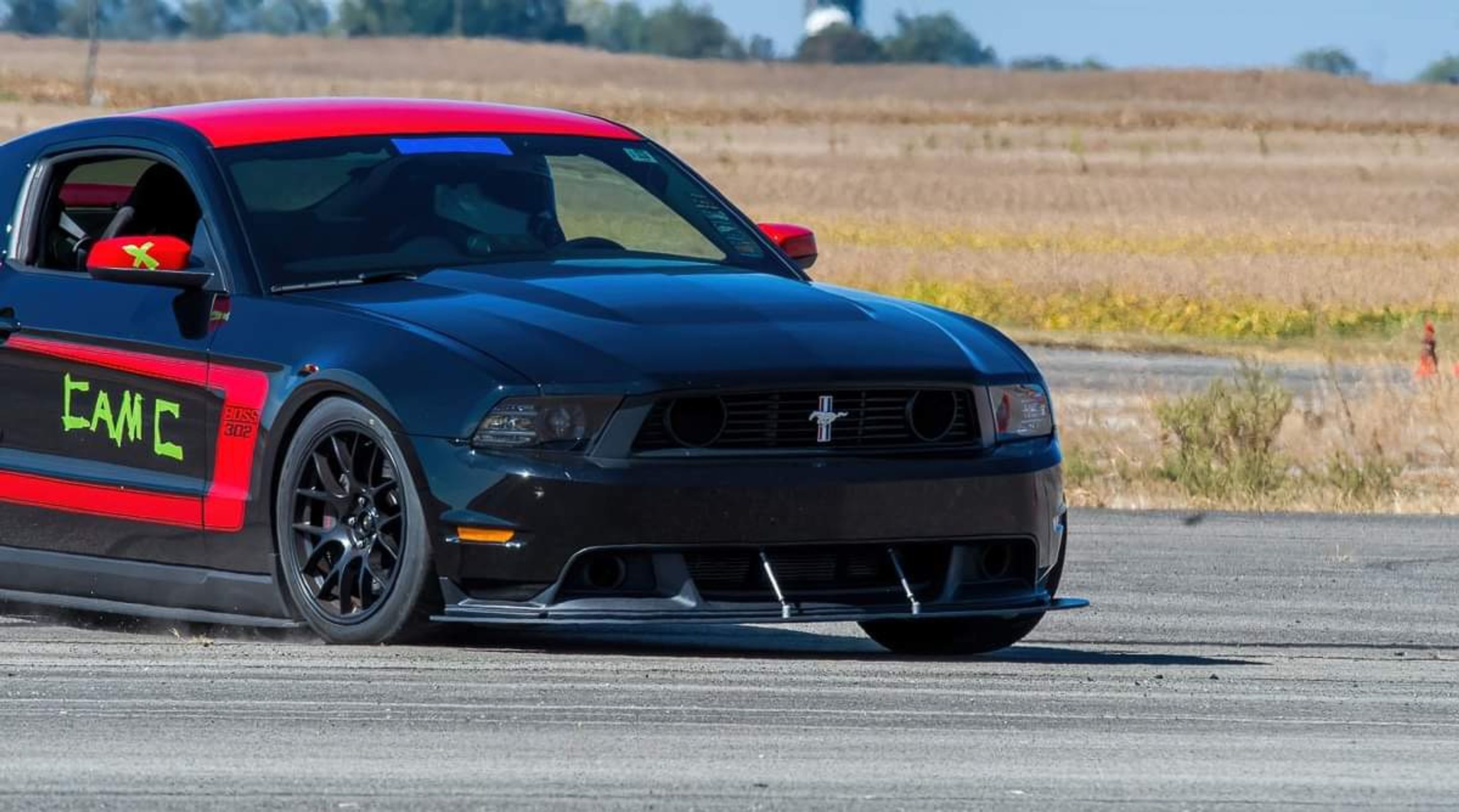 Black Ford S197 Mustang Boss 302 with 18" EC-7 Apex wheels in Satin Black
