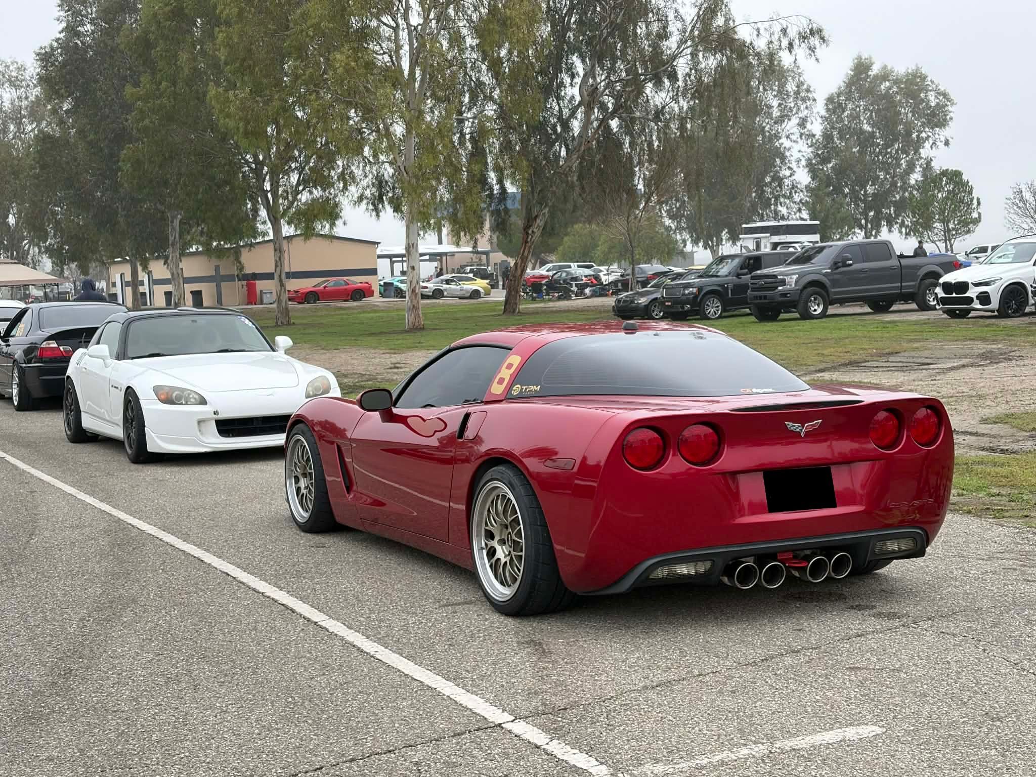 Red Chevrolet C6 Corvette Base/Z51 with 18" ML-10RT Apex wheels in Machined Lip Gloss Motorsport Gold