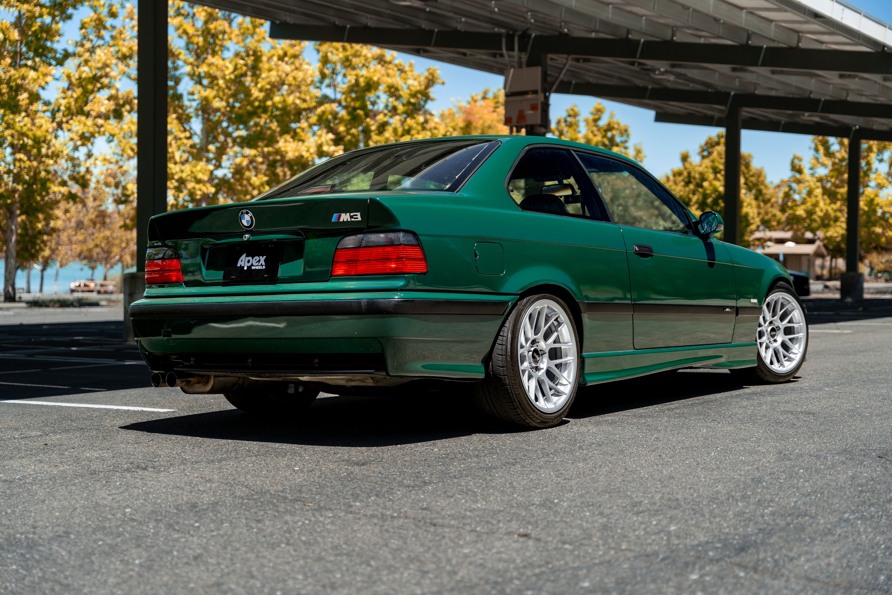 Green BMW E36 M3 with 17" ARC-8 Apex wheels in Race Silver