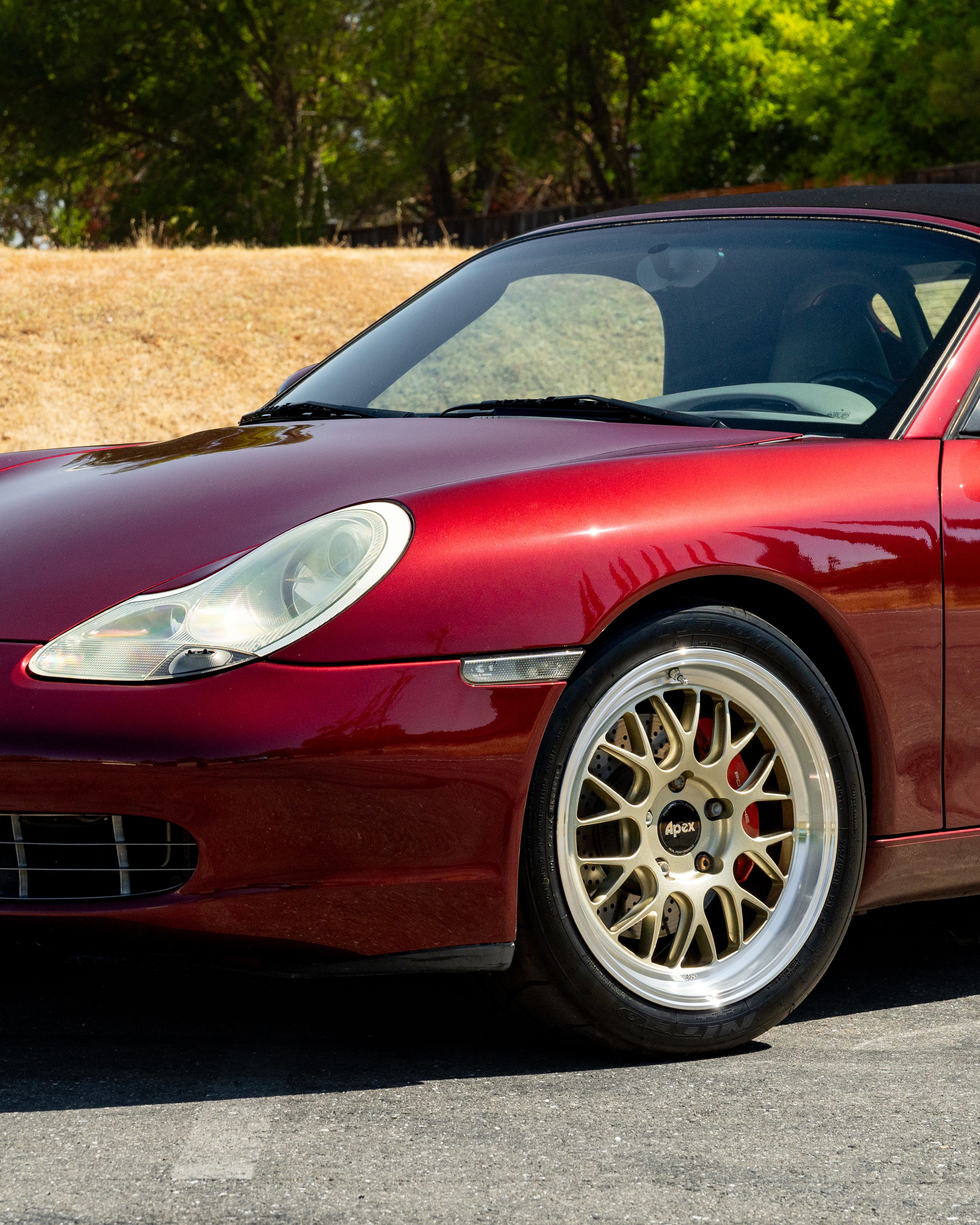 Red Porsche 986 Boxster with 18" ML-10RT Apex wheels in Machined Lip Gloss Motorsport Gold