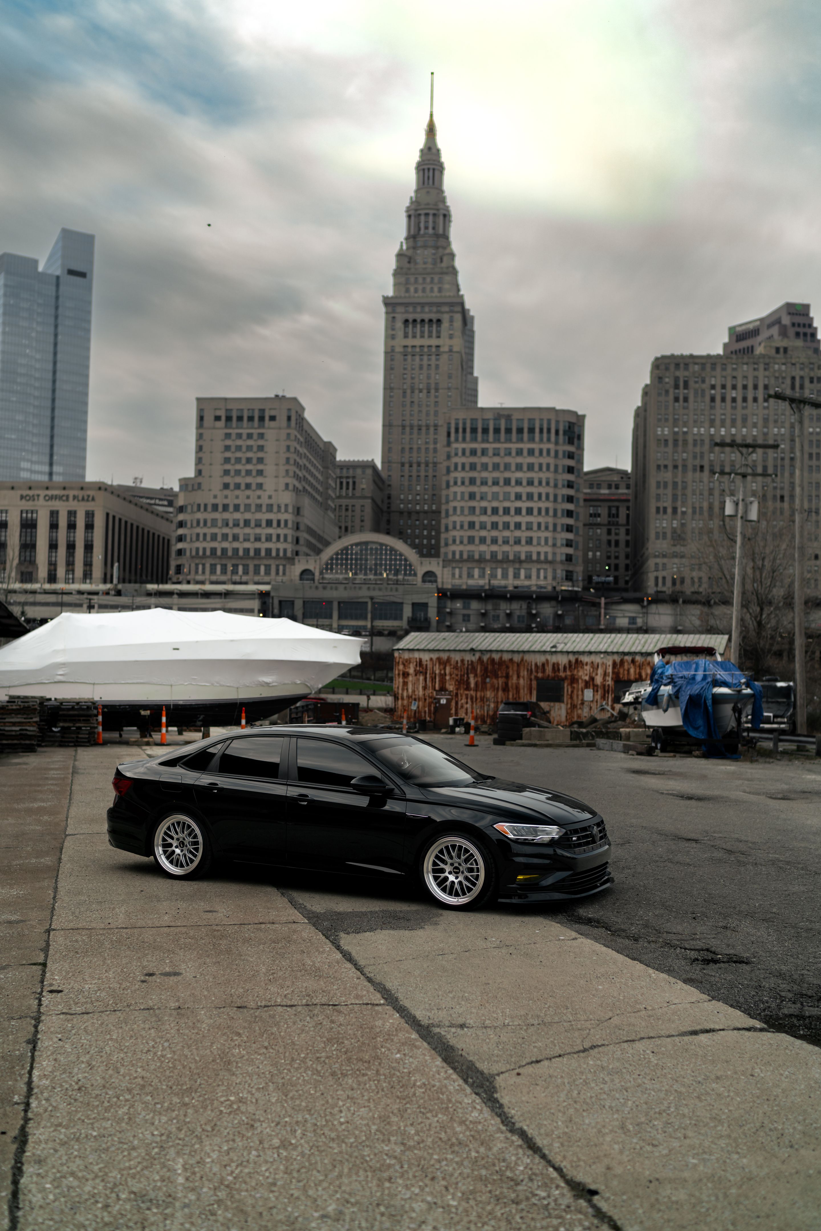 Black VW MK7 Jetta with 19" ML-10RT Apex wheels in Machined Lip Race Silver