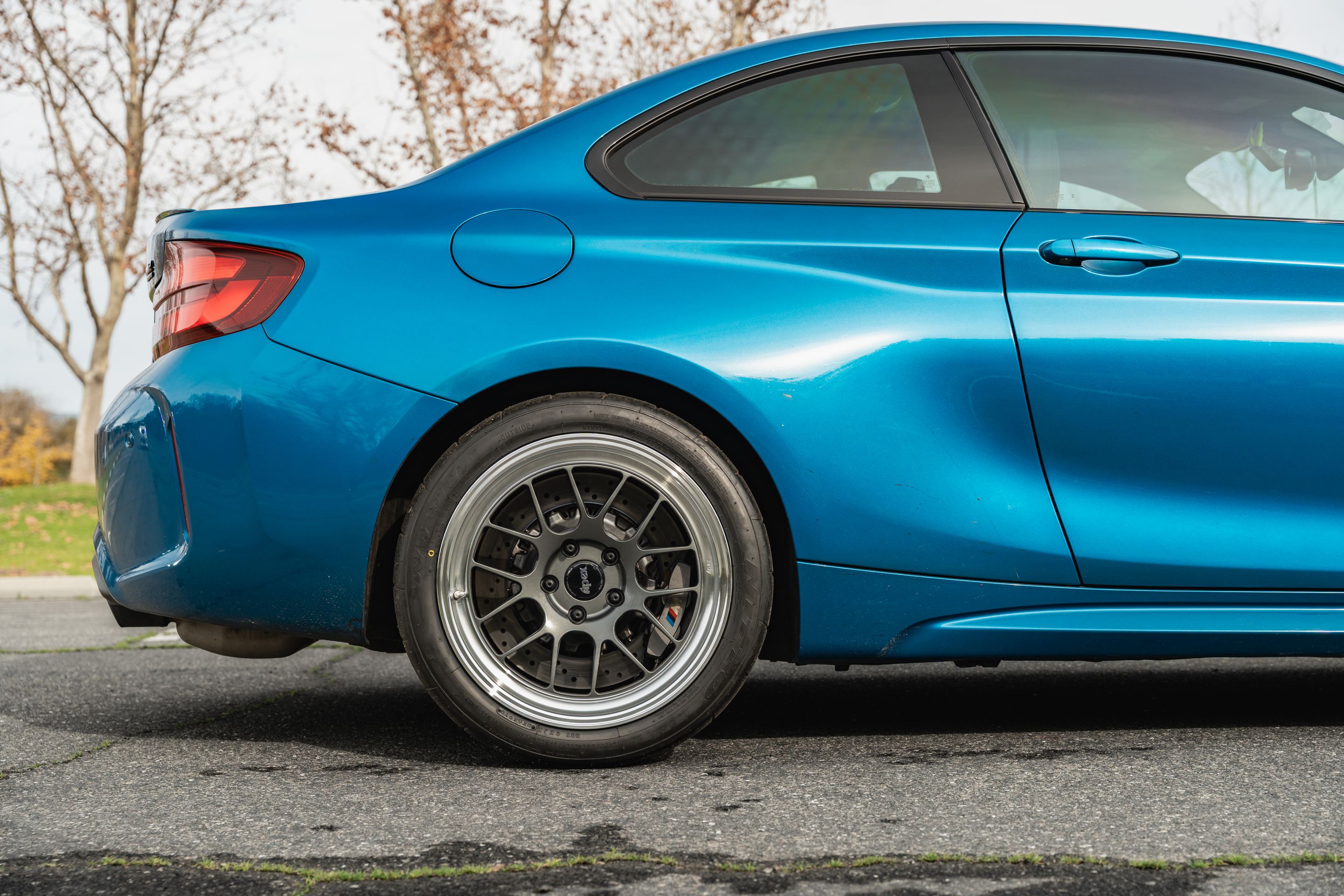 Blue BMW F87 M2 with 18" ML-7RT Apex wheels in Machined Lip Anthracite