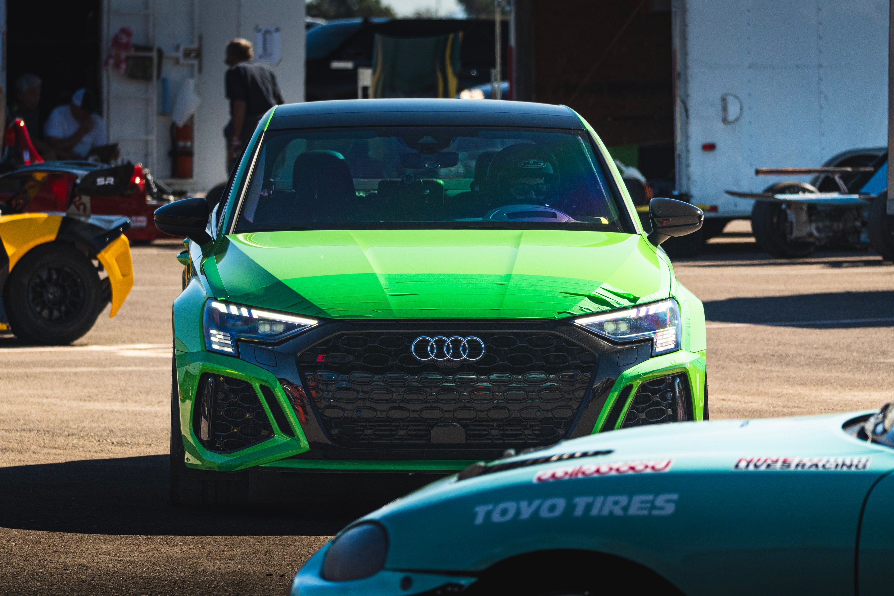Green Audi 8Y RS 3 with 18" VS-5RS Apex wheels in Brushed Clear