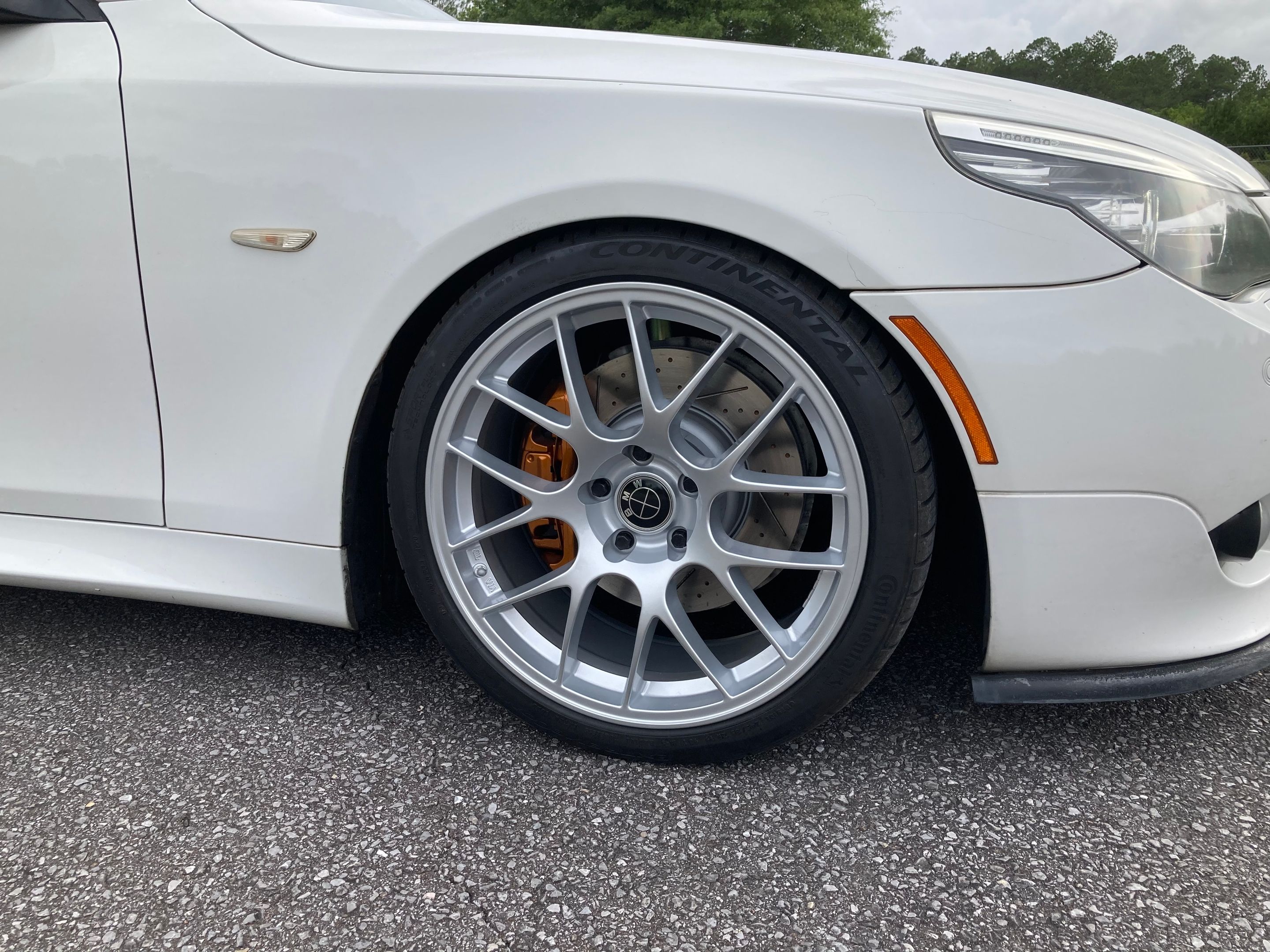 White BMW E60 Sedan 5 Series with 19" EC-7 Apex wheels in Race Silver