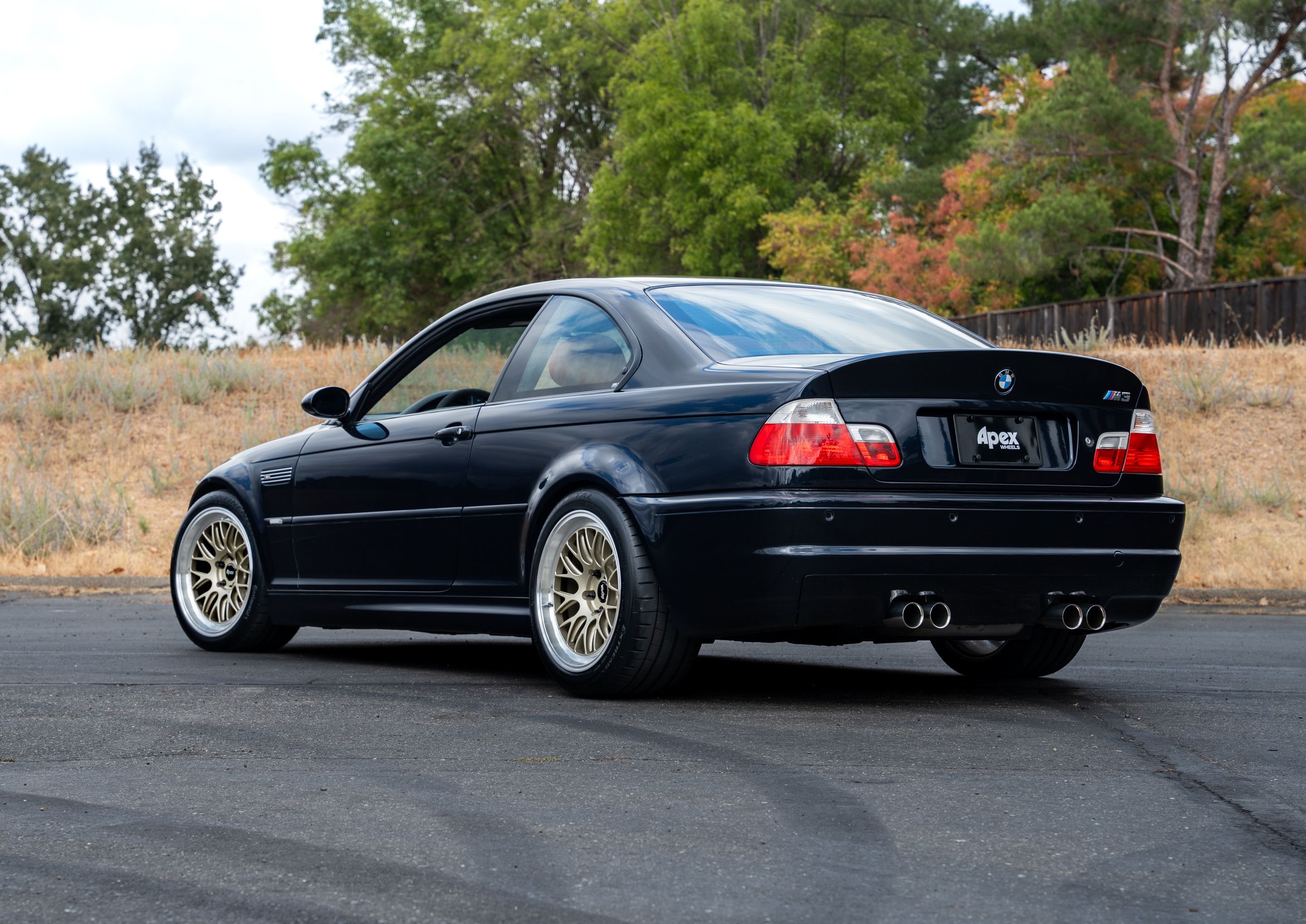 Black BMW E46 M3 with 18" ML-10RT Apex wheels in Machined Lip Gloss Motorsport Gold