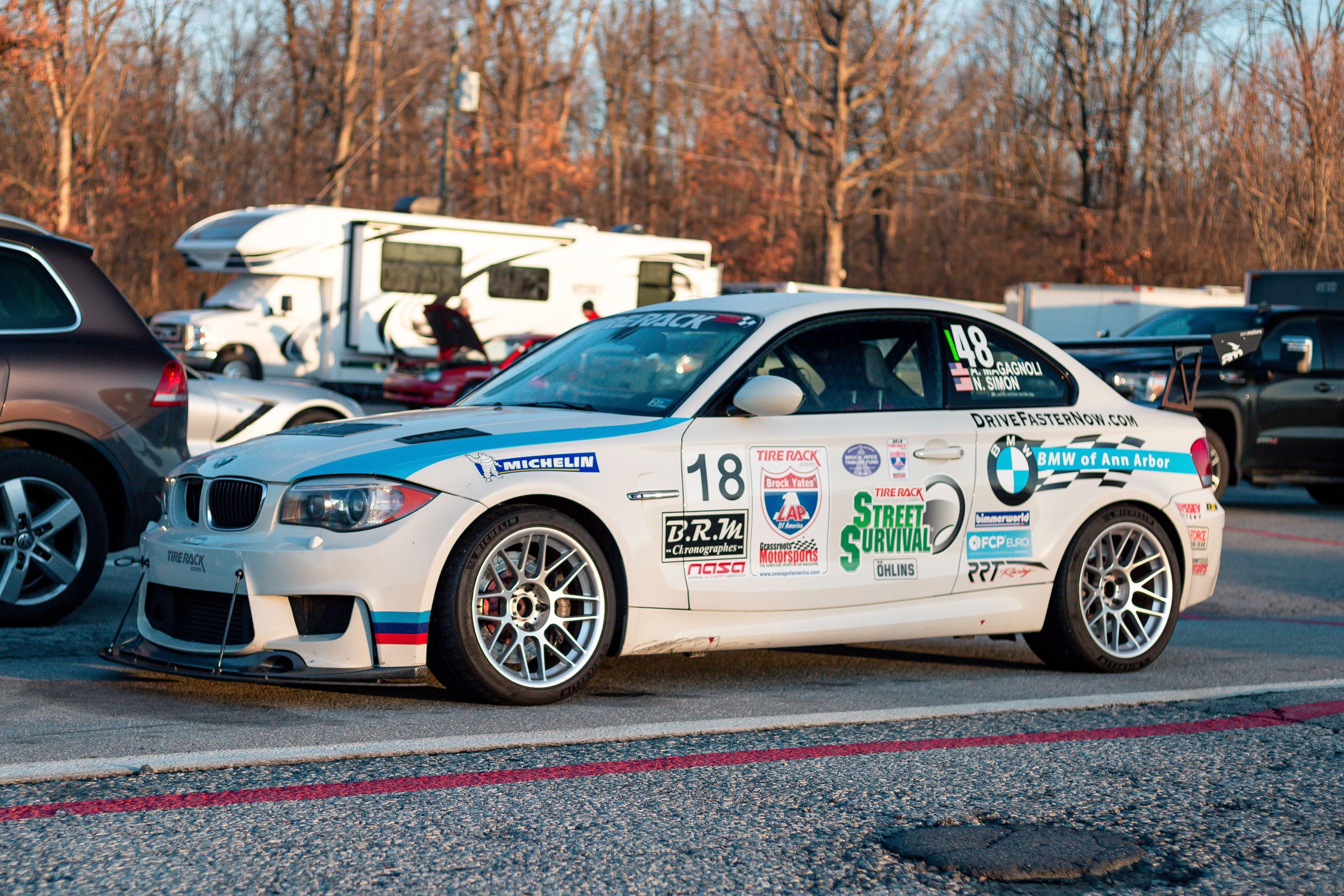 White BMW E82 1M with 18" ARC-8 Apex wheels in Hyper Silver