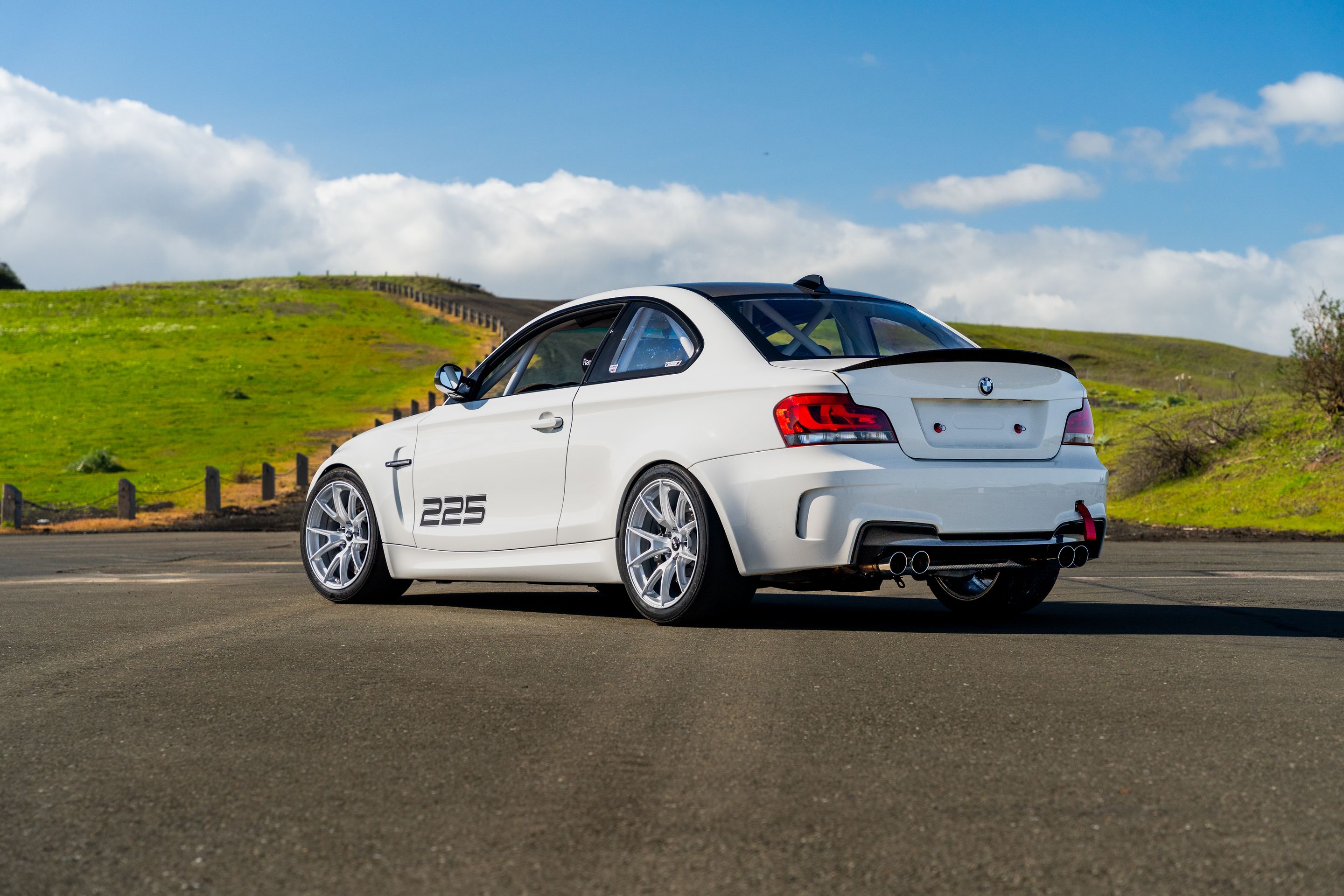 White BMW E82 1M with 18" VS-5 Apex wheels in Race Silver