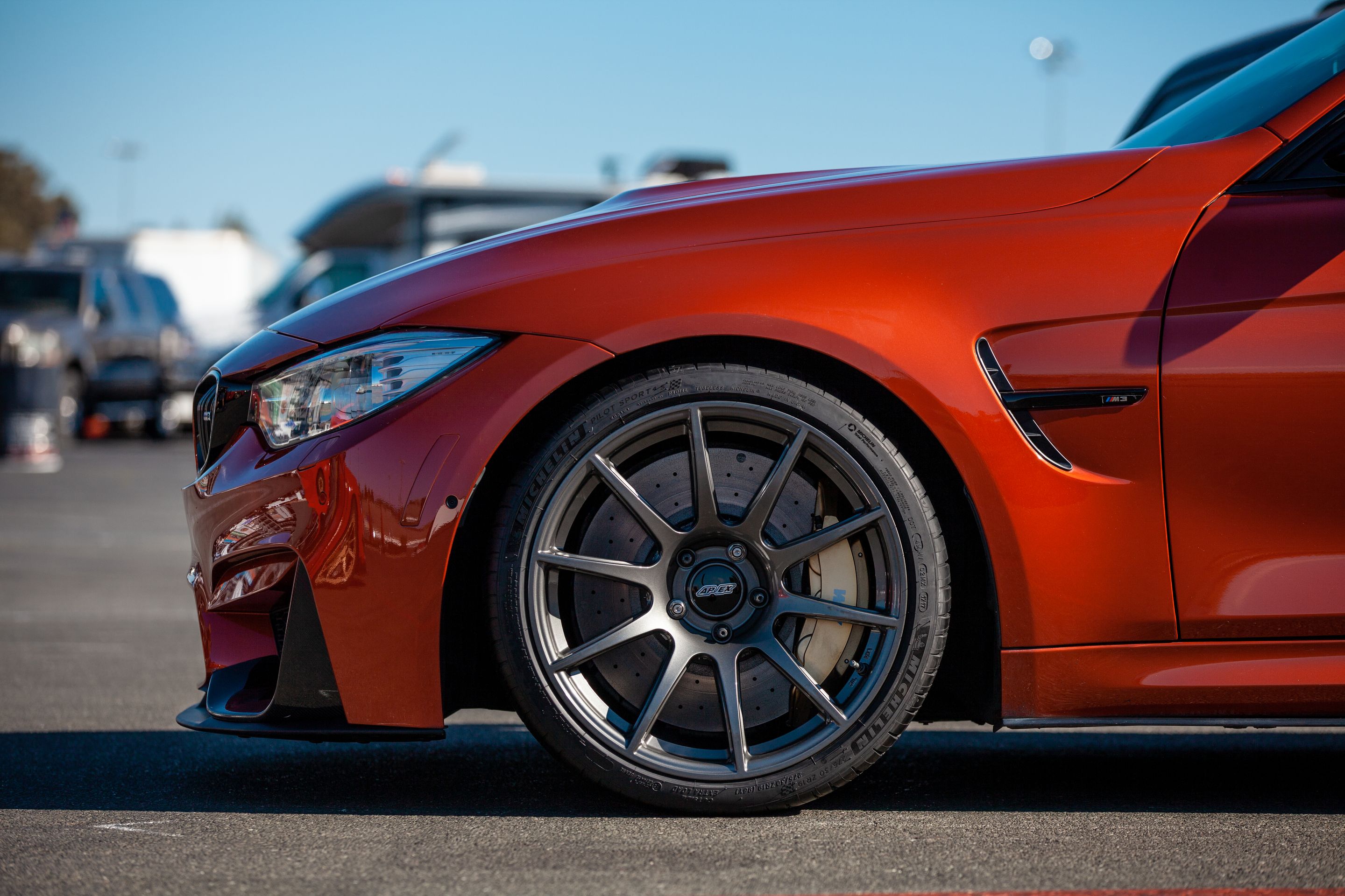 Orange BMW F80 M3 with 19" SM-10 Apex wheels in Anthracite