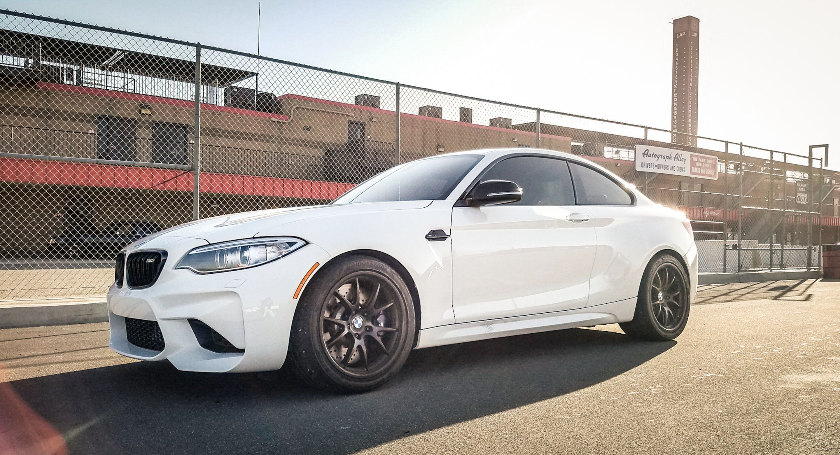 White BMW F87 M2 with 18" FL-5 Apex wheels in Satin Black