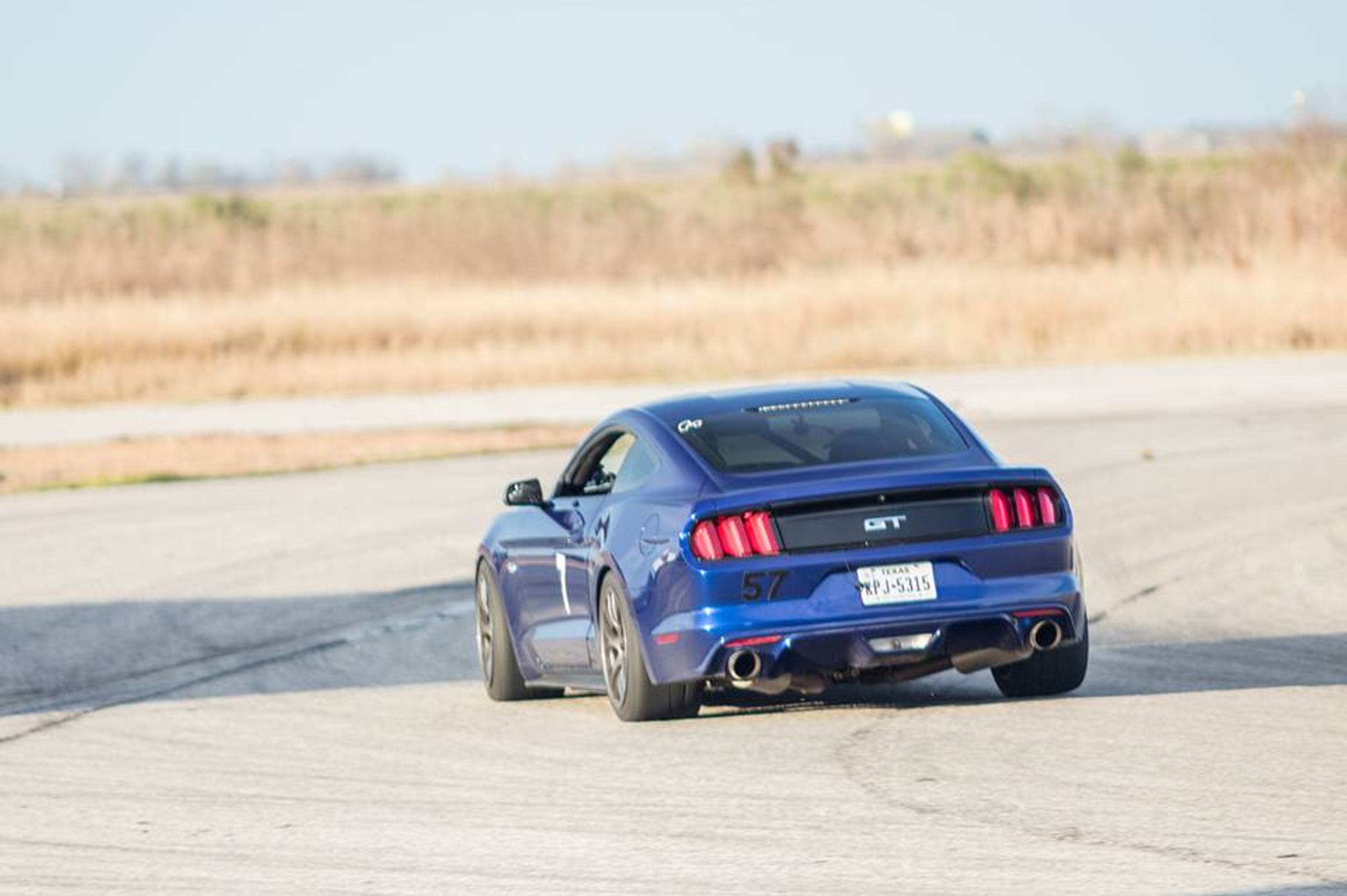 Blue Ford S550 Mustang GT with 18" EC-7 Apex wheels in Anthracite