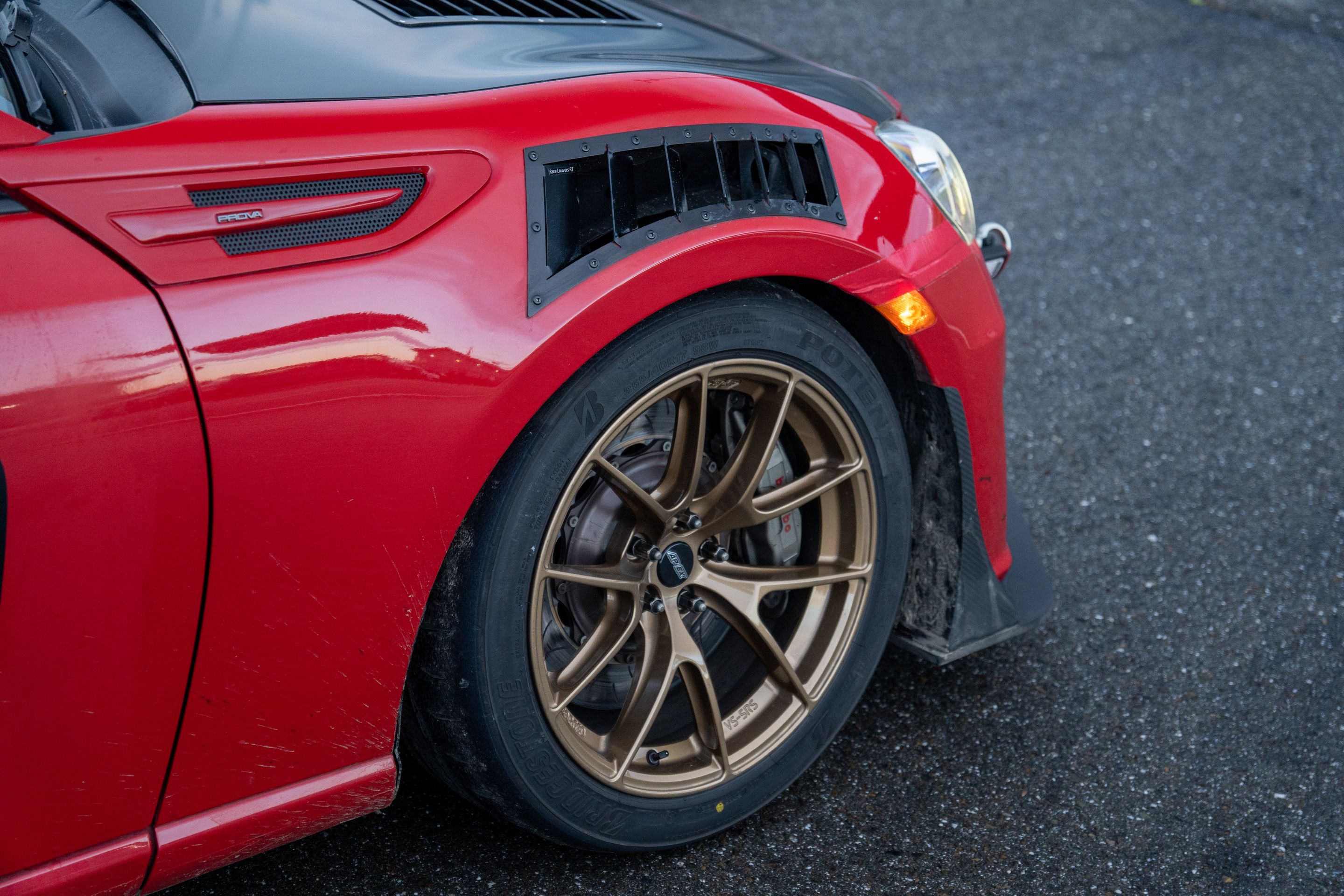 Red Subaru ZC6 / Gen 1 BRZ with 17" VS-5RS Apex wheels in Gloss Gold