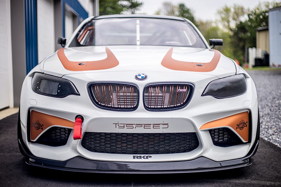 White BMW F87 M2 with 18" FL-5 Apex wheels in Satin Black