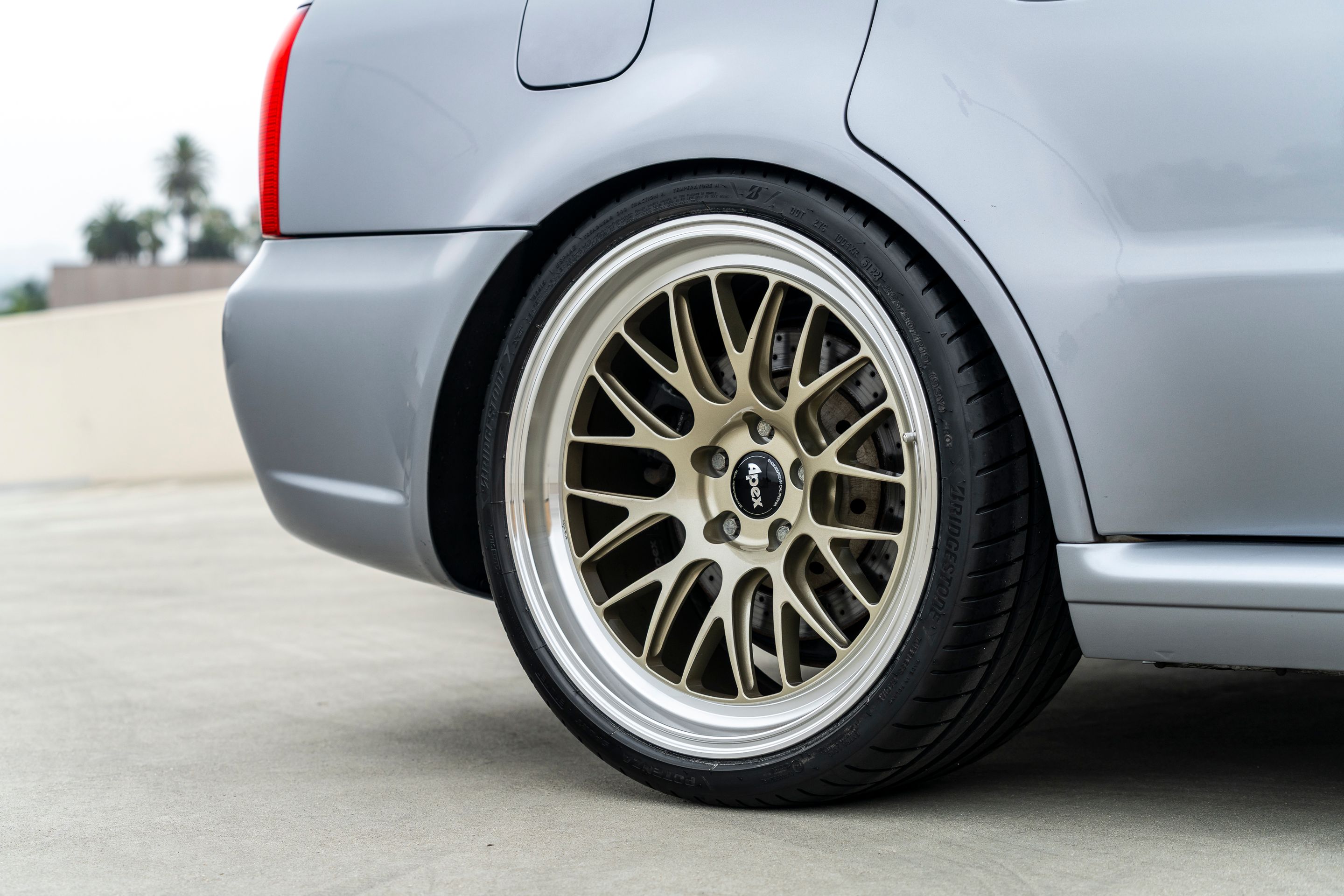 Silver Audi B5 RS 4 Avant/Wagon with 19" ML-10RT Apex wheels in Machined Lip Gloss Motorsport Gold