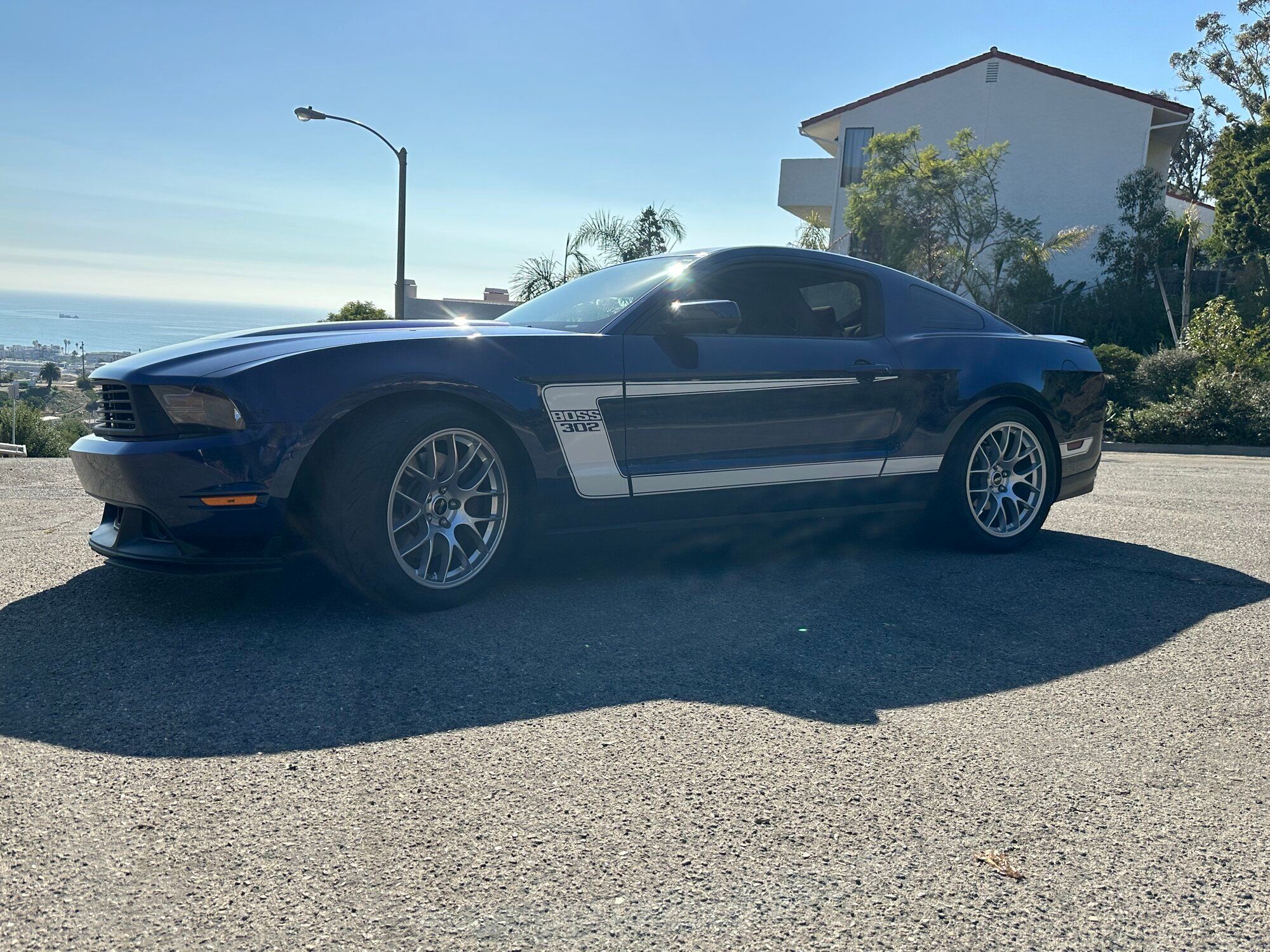 Blue Ford S197 Mustang Boss 302 with 19" EC-7 Apex wheels in Race Silver