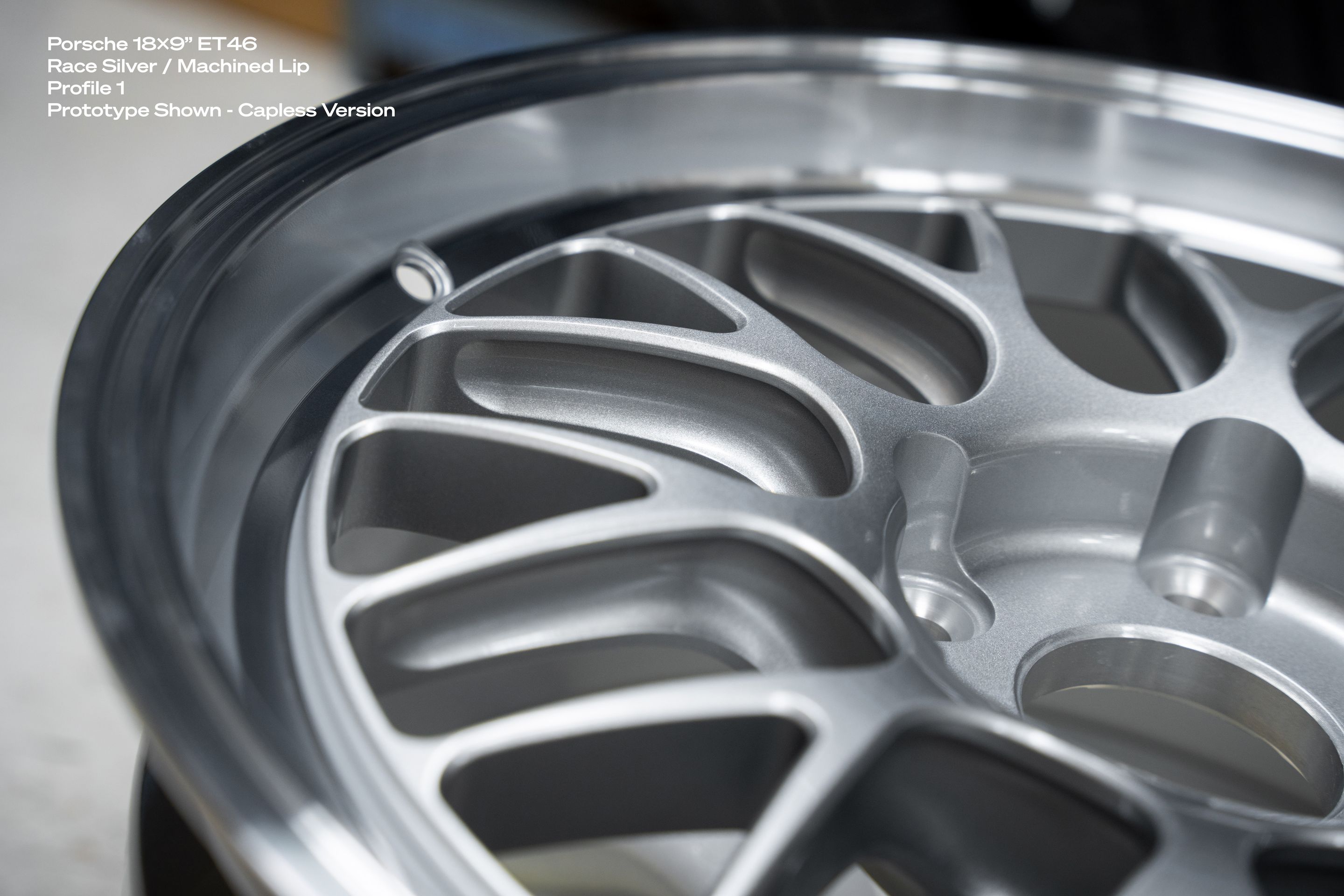 White Porsche 987 Cayman S with 18" ML-10RT Apex wheels in Race Silver