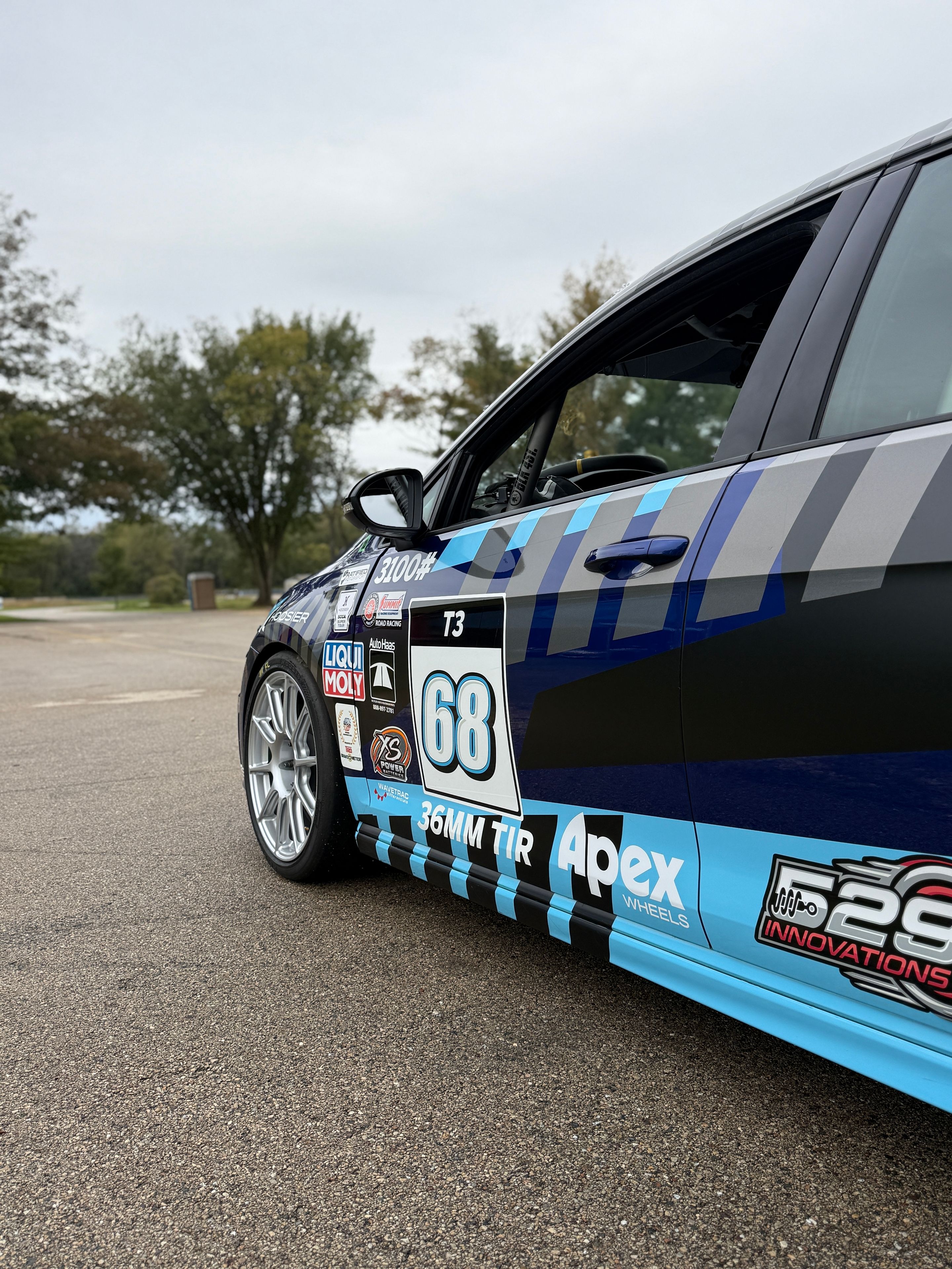 Race Livery VW MK7 Golf R with 18" SM-10 Apex wheels in Race Silver