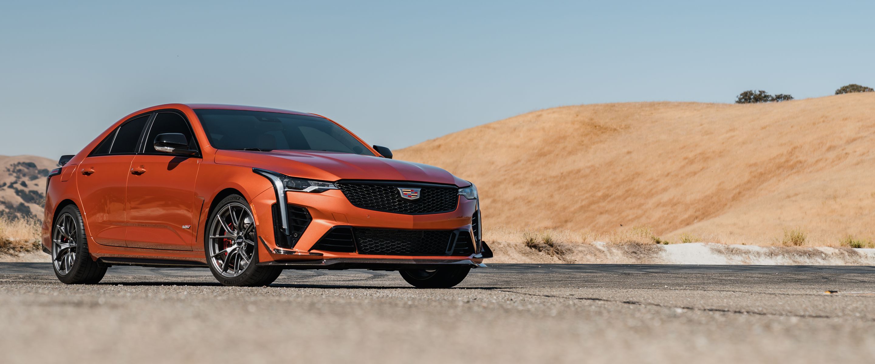 Orange Cadillac CT4-V Blackwing with 18" VS-5RS Apex wheels in Anthracite