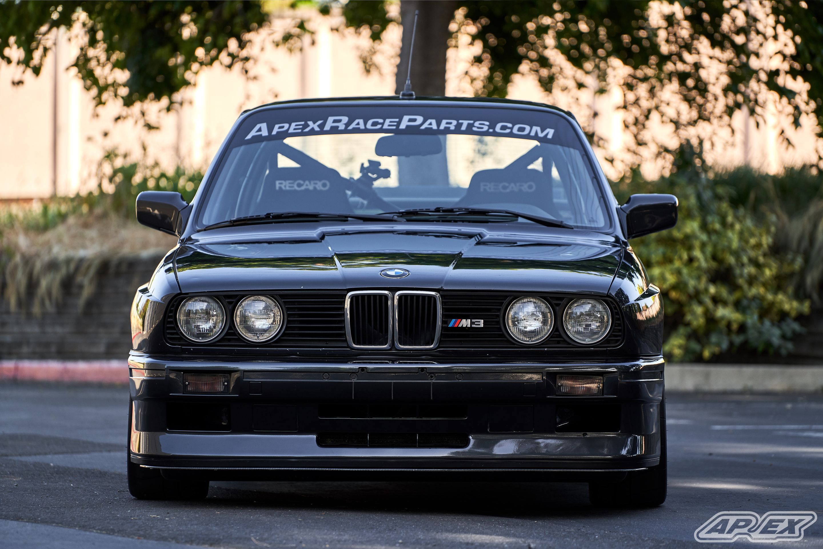 Black BMW E30 M3 with 17" ARC-8 Apex wheels in Hyper Silver
