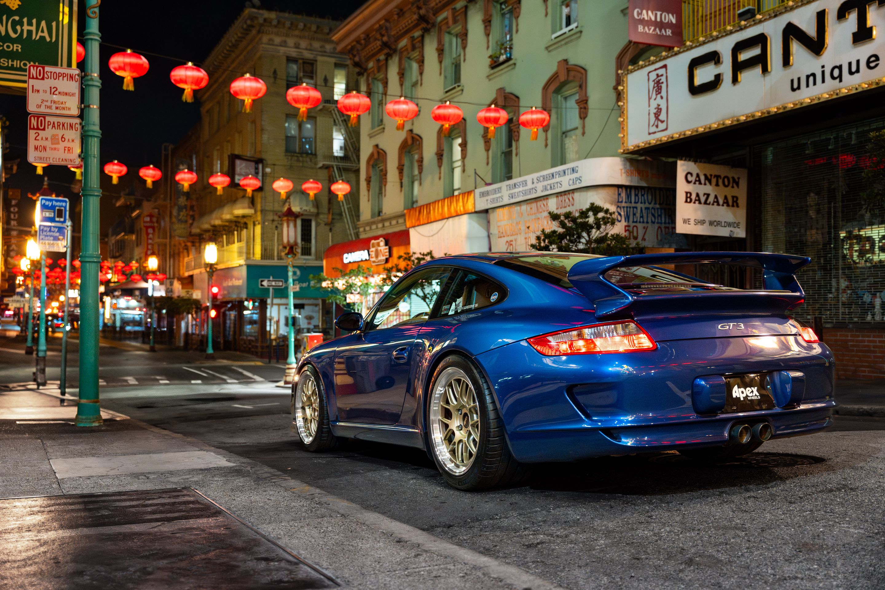 Blue Porsche 911 997 GT3 with 19" TEST-M Apex wheels in Machined Lip Gloss Motorsport Gold
