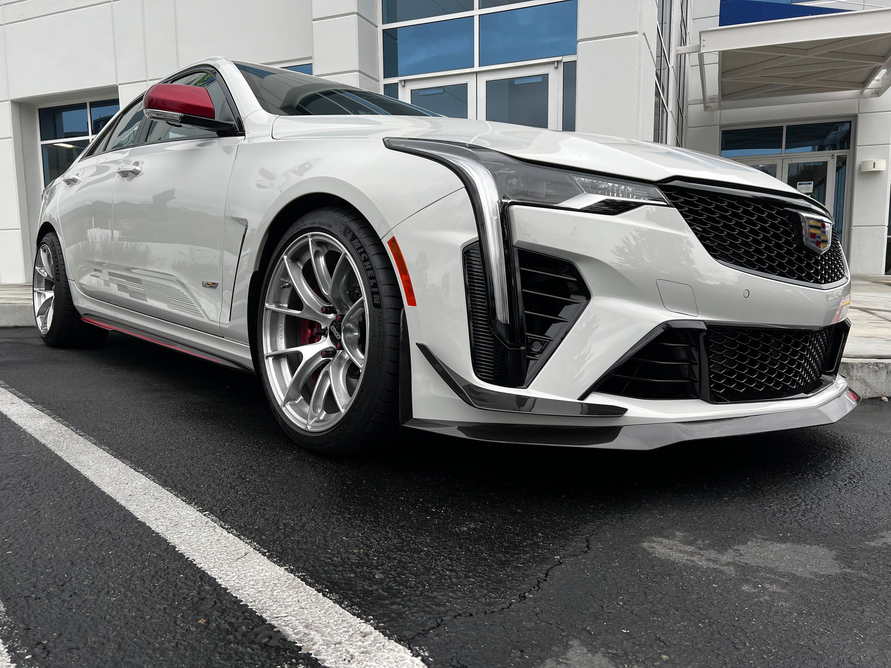 White Cadillac CT4-V Blackwing with 18" VS-5RS Apex wheels in Brushed Clear