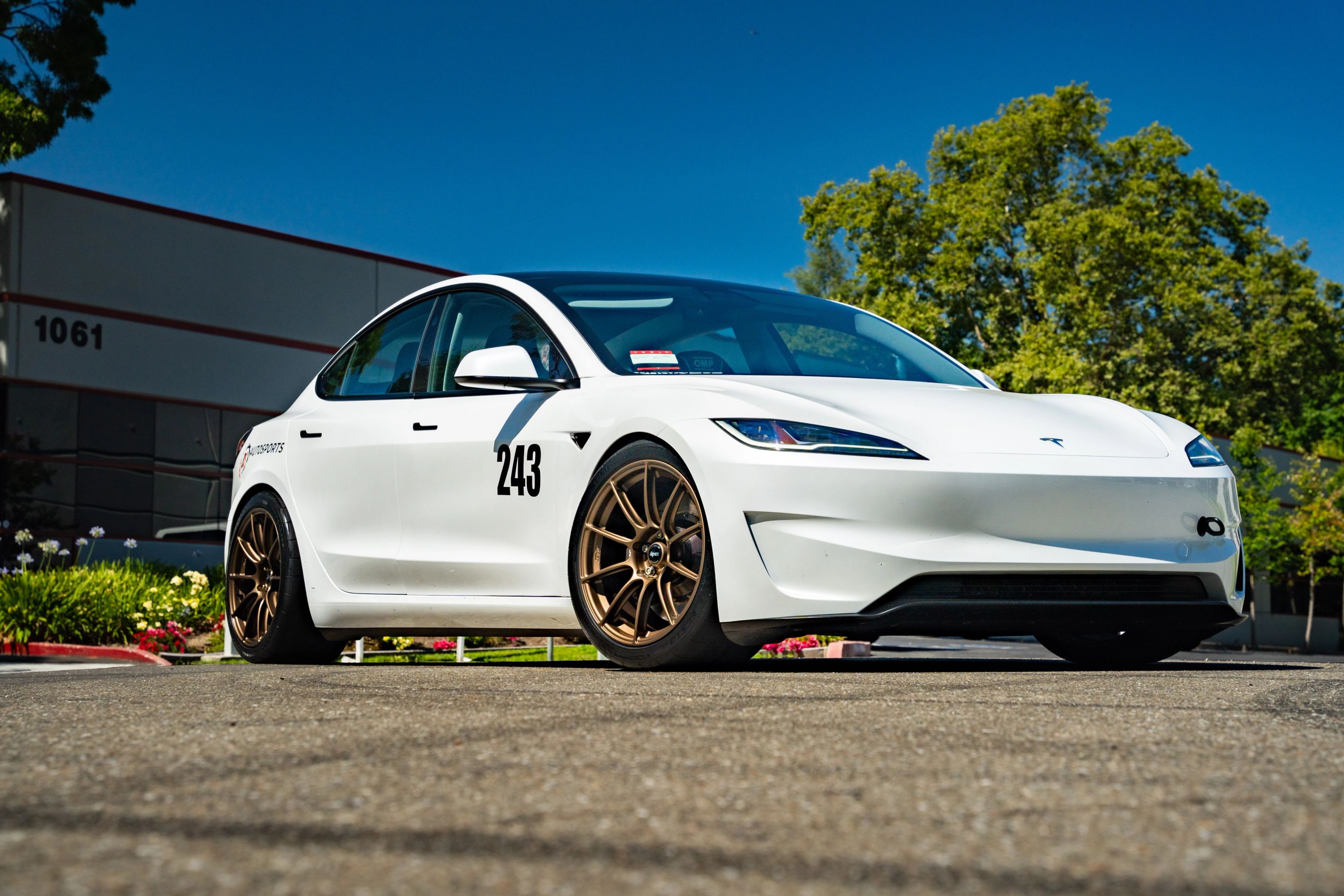 White Tesla Model 3 with 19" SM-10RS Apex wheels in Satin Bronze