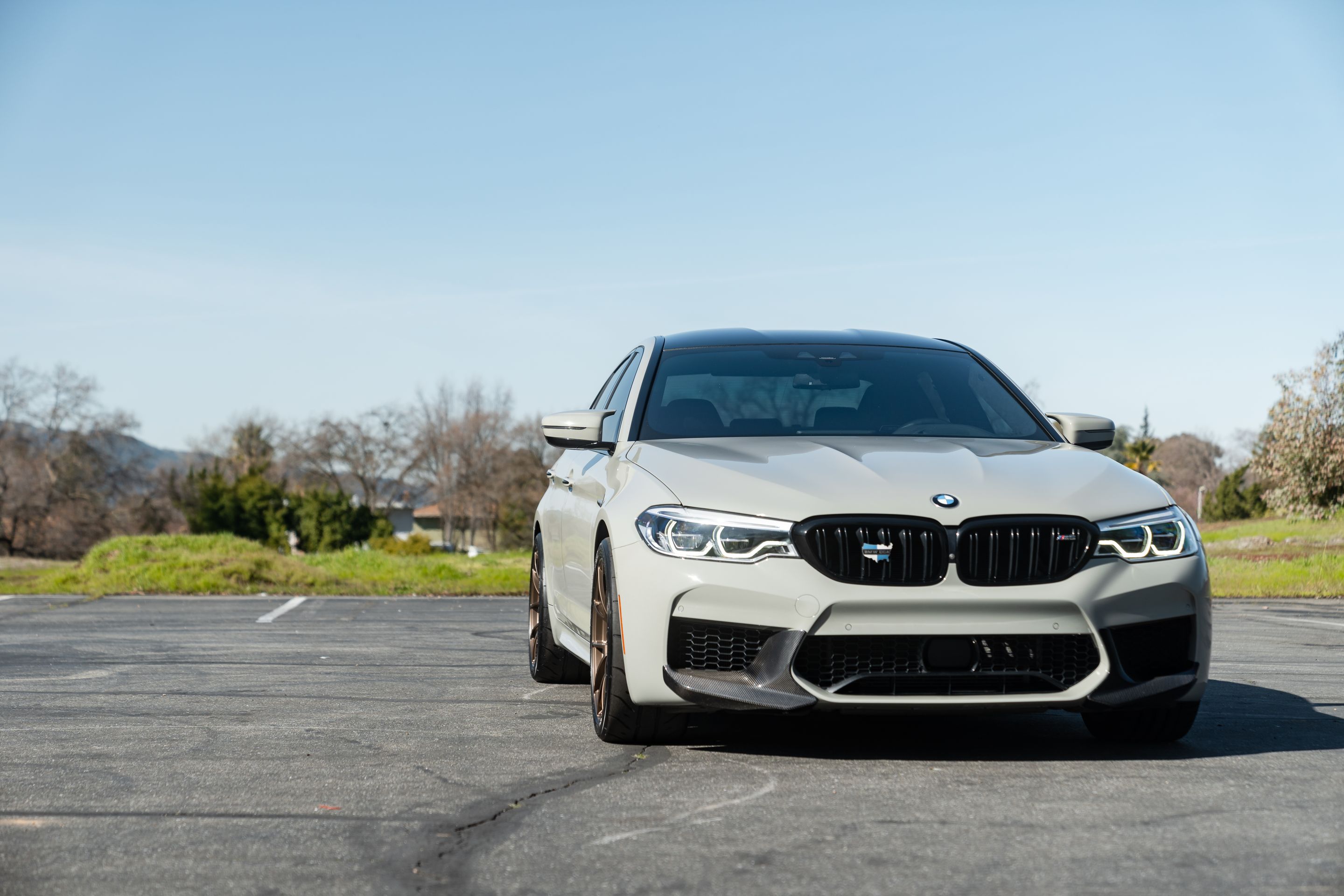 Grey BMW F90 M5 with 19" VS-5RS Apex wheels in Satin Bronze