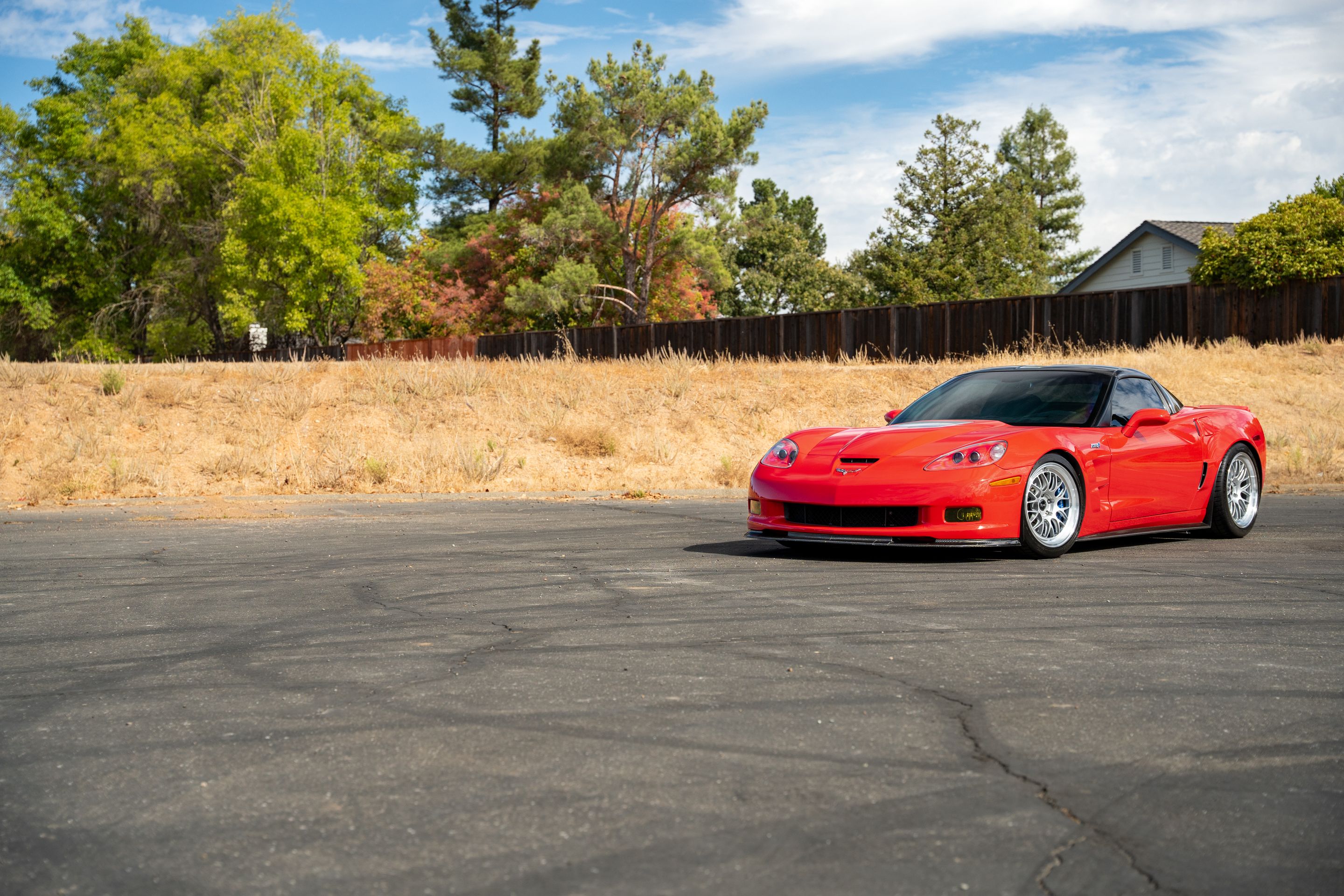 Red Chevrolet C6 Corvette ZR-1 with 18"/19" ML-10RT Apex wheels in Machined Lip Race Silver