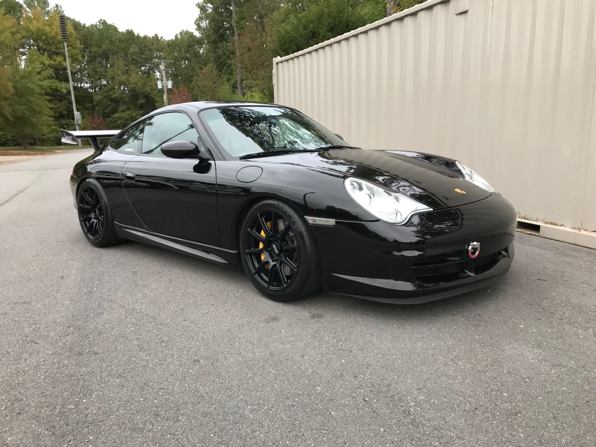 Black Porsche 911 996 GT3 with 18" SM-10 Apex wheels in Satin Black