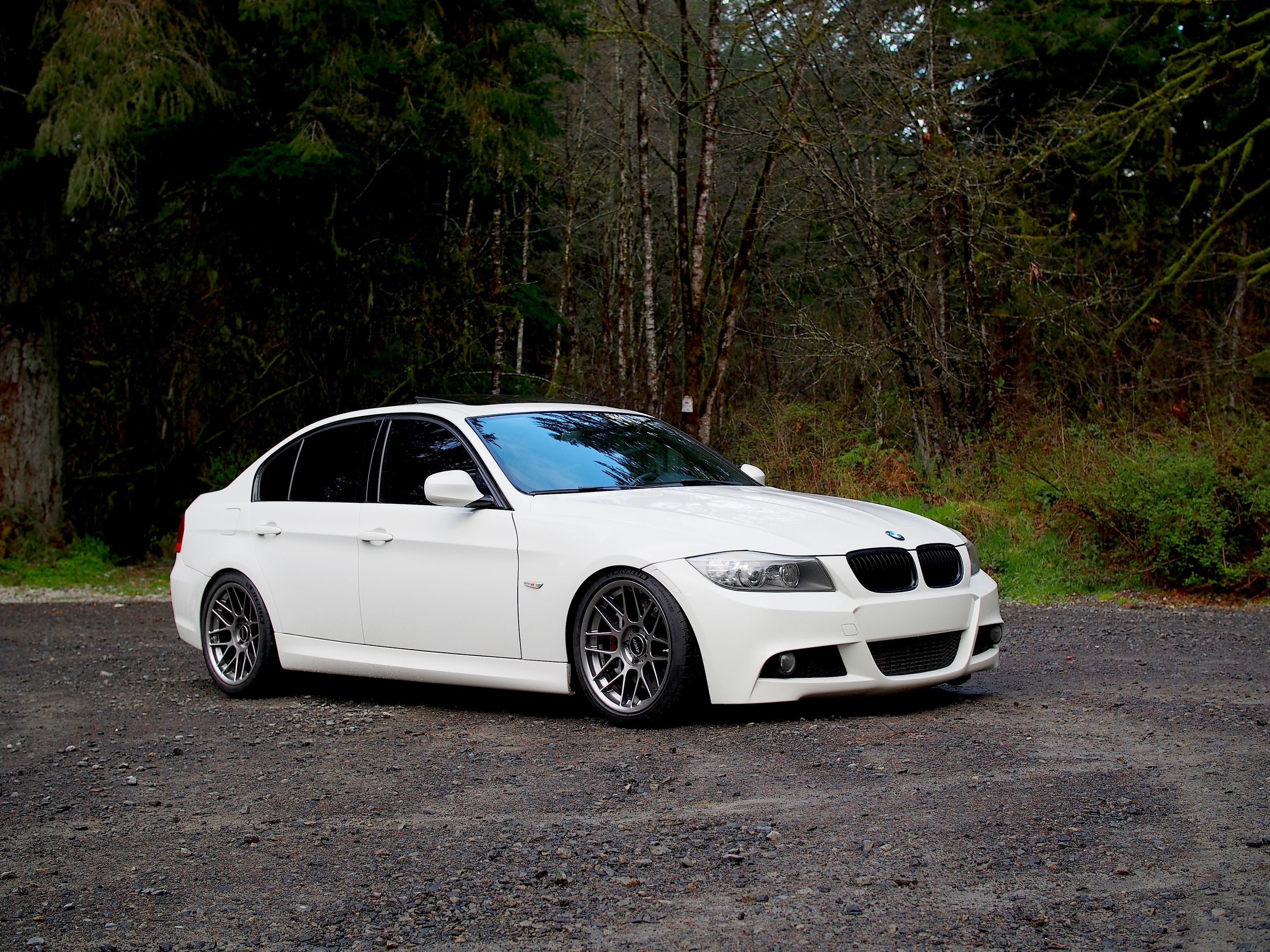 White BMW E90 LCI Sedan 3 Series with 18" ARC-8 Apex wheels in Hyper Black